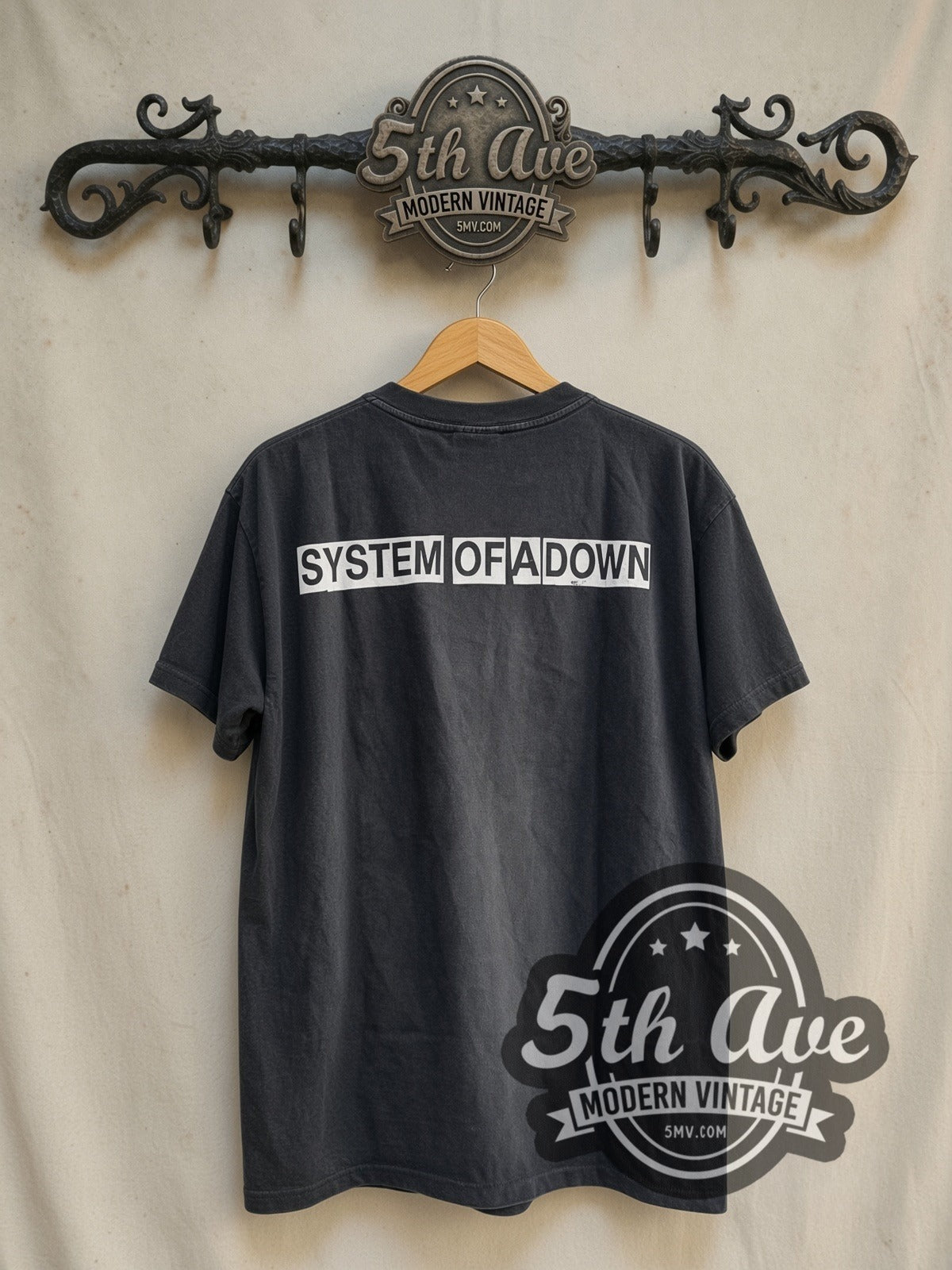 System of a Down Debut Studio Album 1998 vintage band t-shirt in black, back view on a display rack