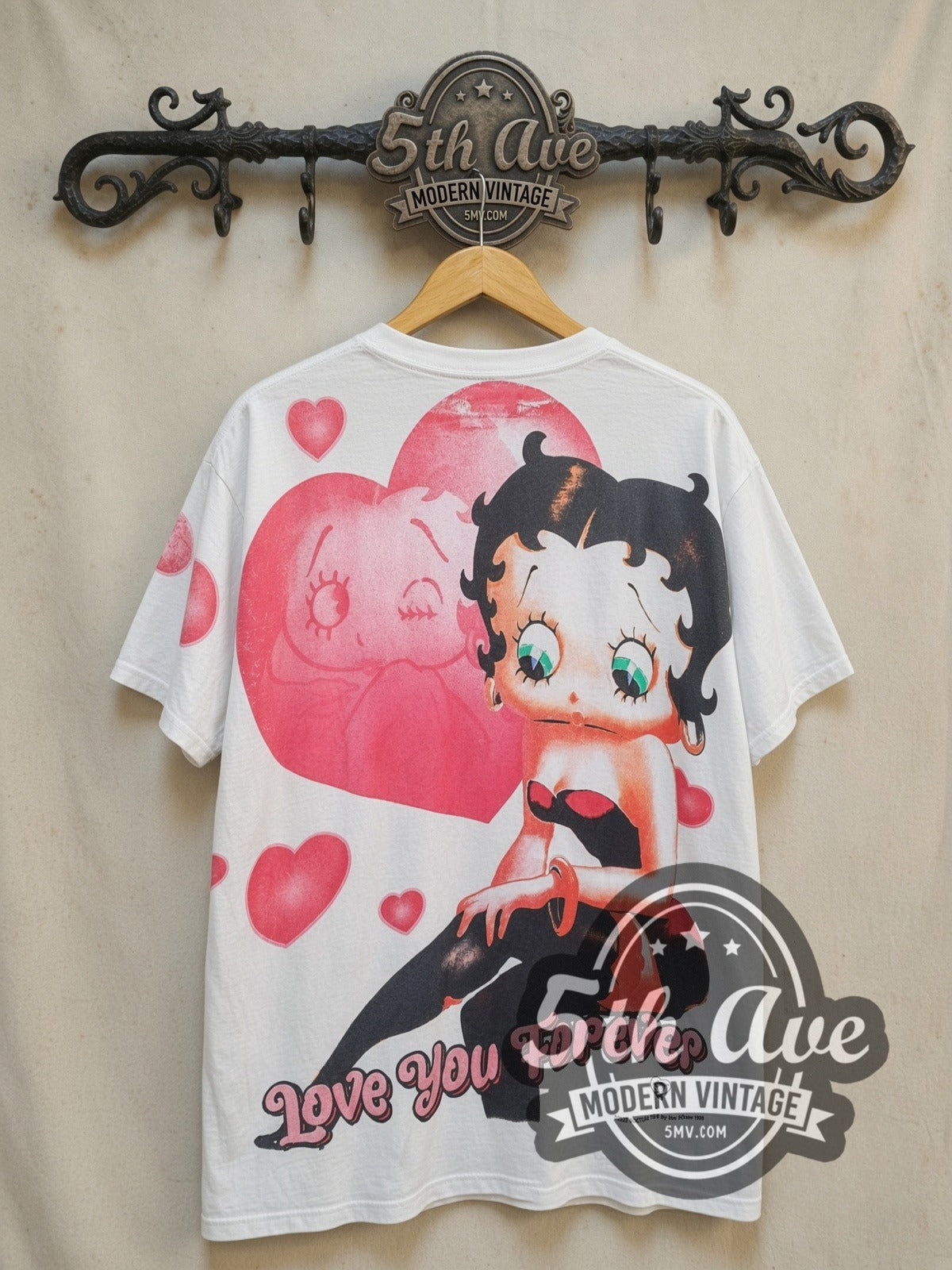 Betty Boop Valentine all-over-print vintage cartoon tee, back view on a display rack