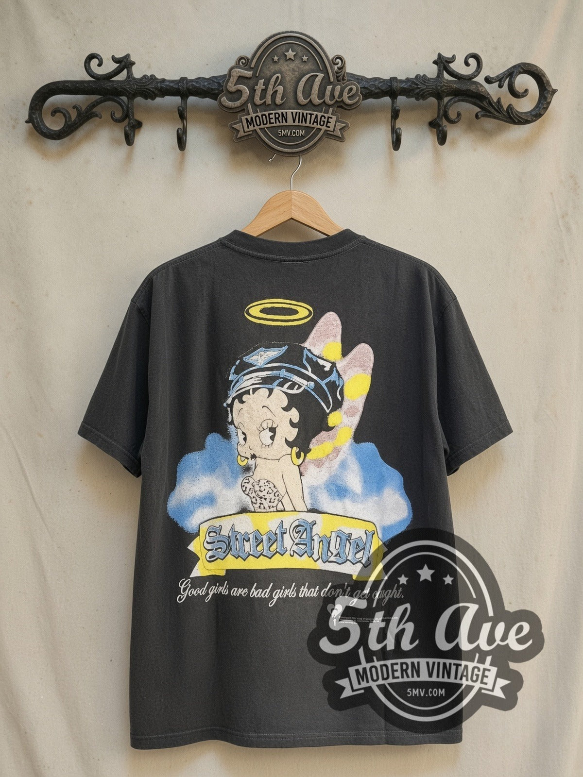 Betty Boop Street Angel vintage cartoon tee in black, back view on a display rack