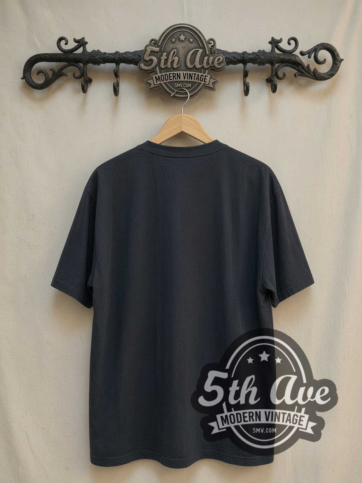 The Cure Four Member Photo White Script vintage band t-shirt in white, back view on a display rack