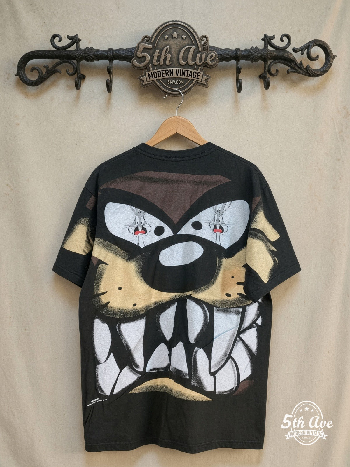 Bugs Bunny – Taz-Mania and Bugs Bunny – All Over Print – New Vintage Graphic Tee — back on locked cream ornate 5th Ave rack