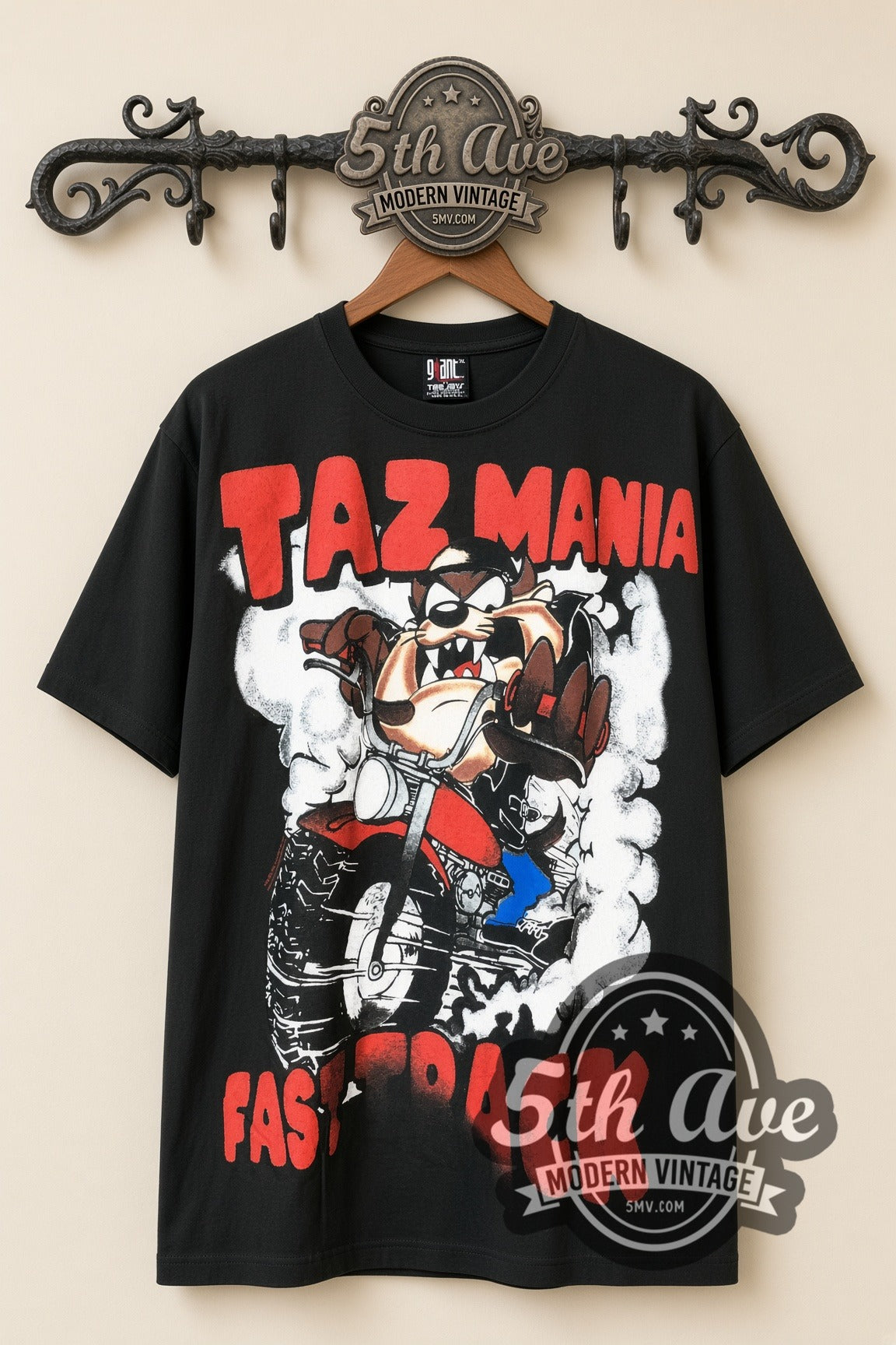 Looney Tunes Taz-Mania Fast Track - AOP all over print vintage cartoon t-shirt, front view on a display rack