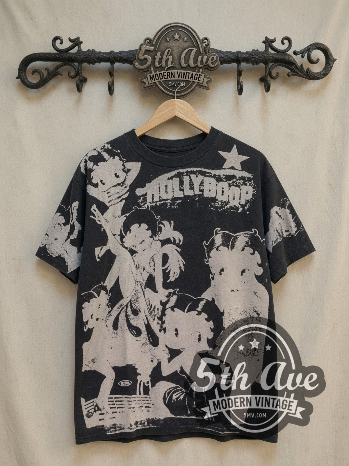 Betty Boop Holly Boop all-over-print vintage cartoon tee, front view on a display rack
