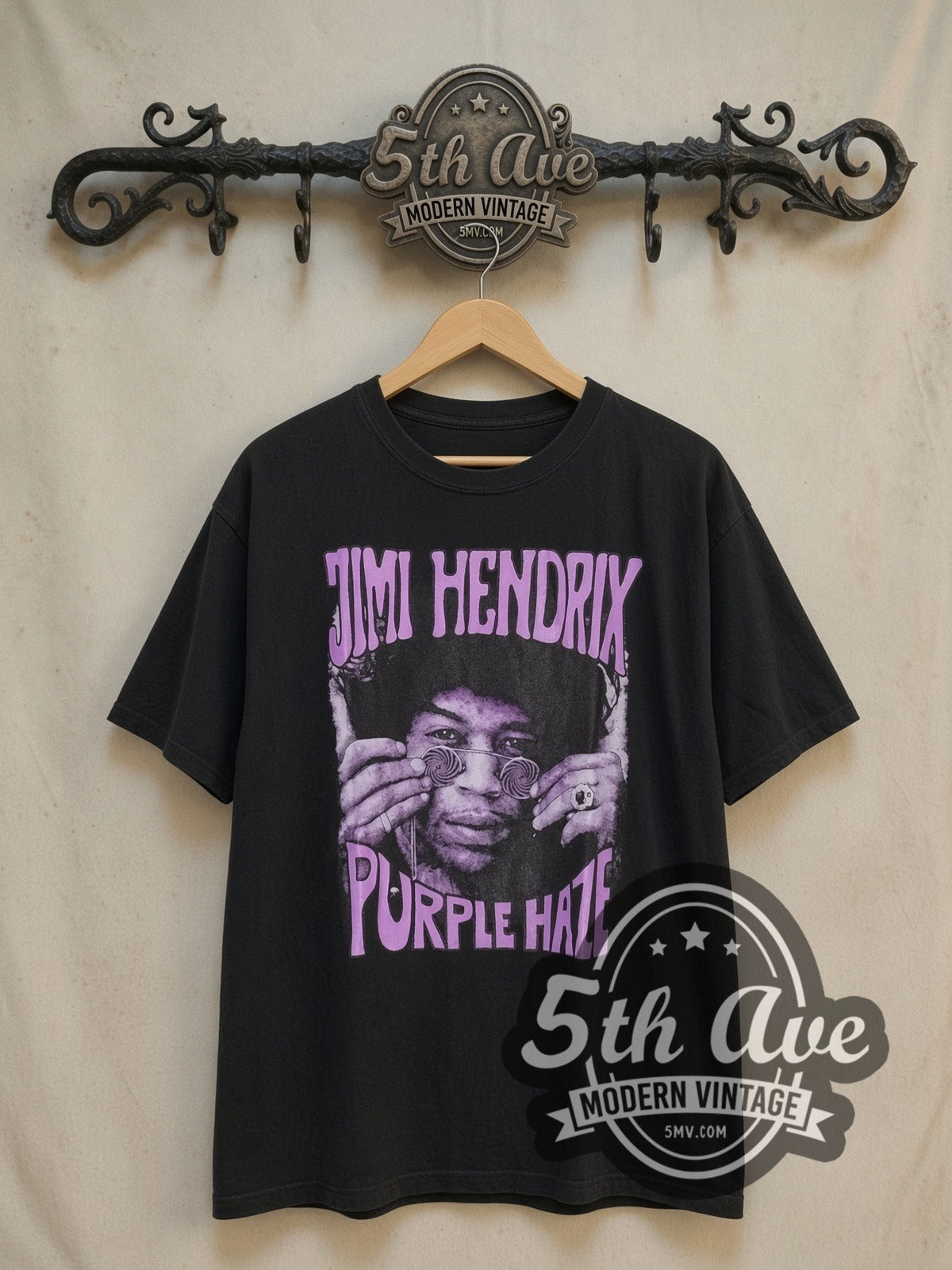 Jimi Hendrix Purple Haze vintage band t-shirt, front view on a display rack