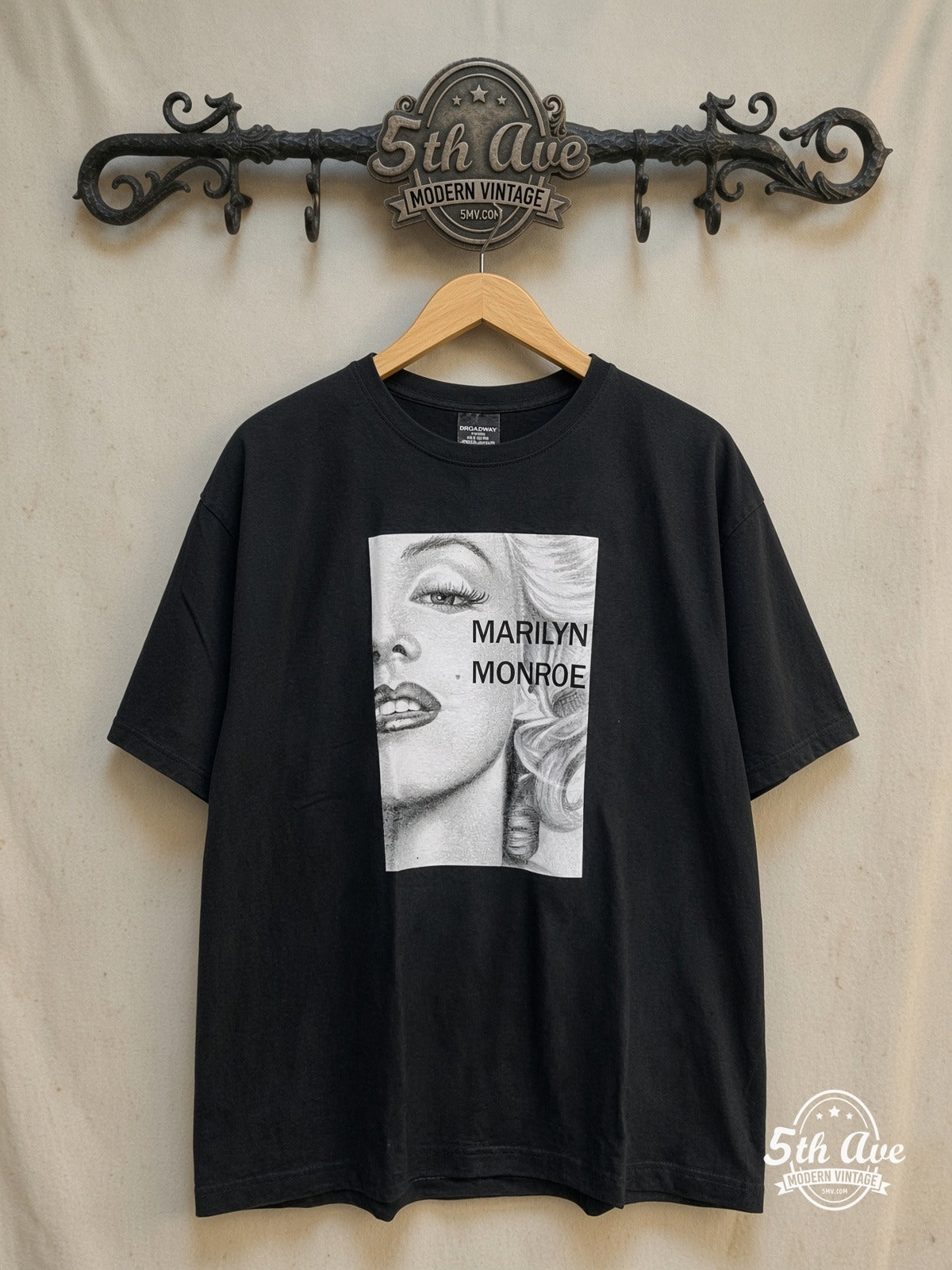 Marilyn Monroe – Vintage Graphic Tee — front on locked cream ornate 5th Ave rack