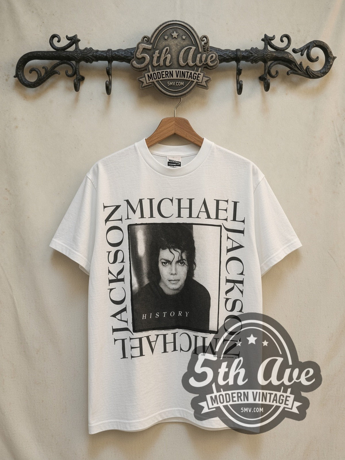 Michael Jackson King of Pop vintage band t-shirt, front view on a display rack