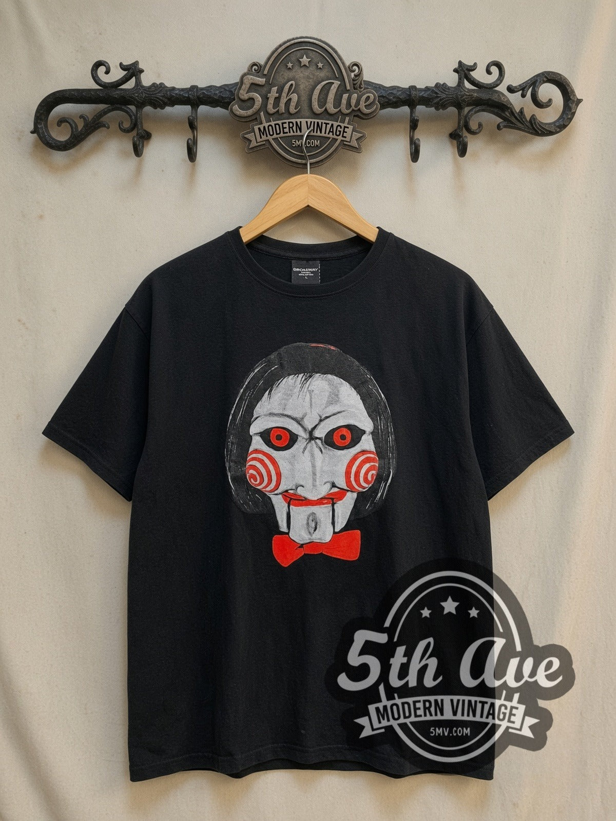 Saw Jigsaw vintage movie t-shirt, front view on a display rack