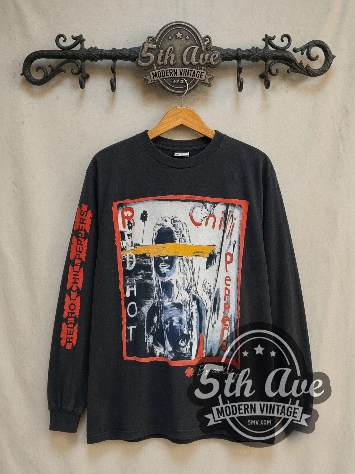 Red Hot Chili Peppers By the Way Yellow Eye Stripe Long Sleeve vintage band t-shirt in black, front view on the 5MV rack