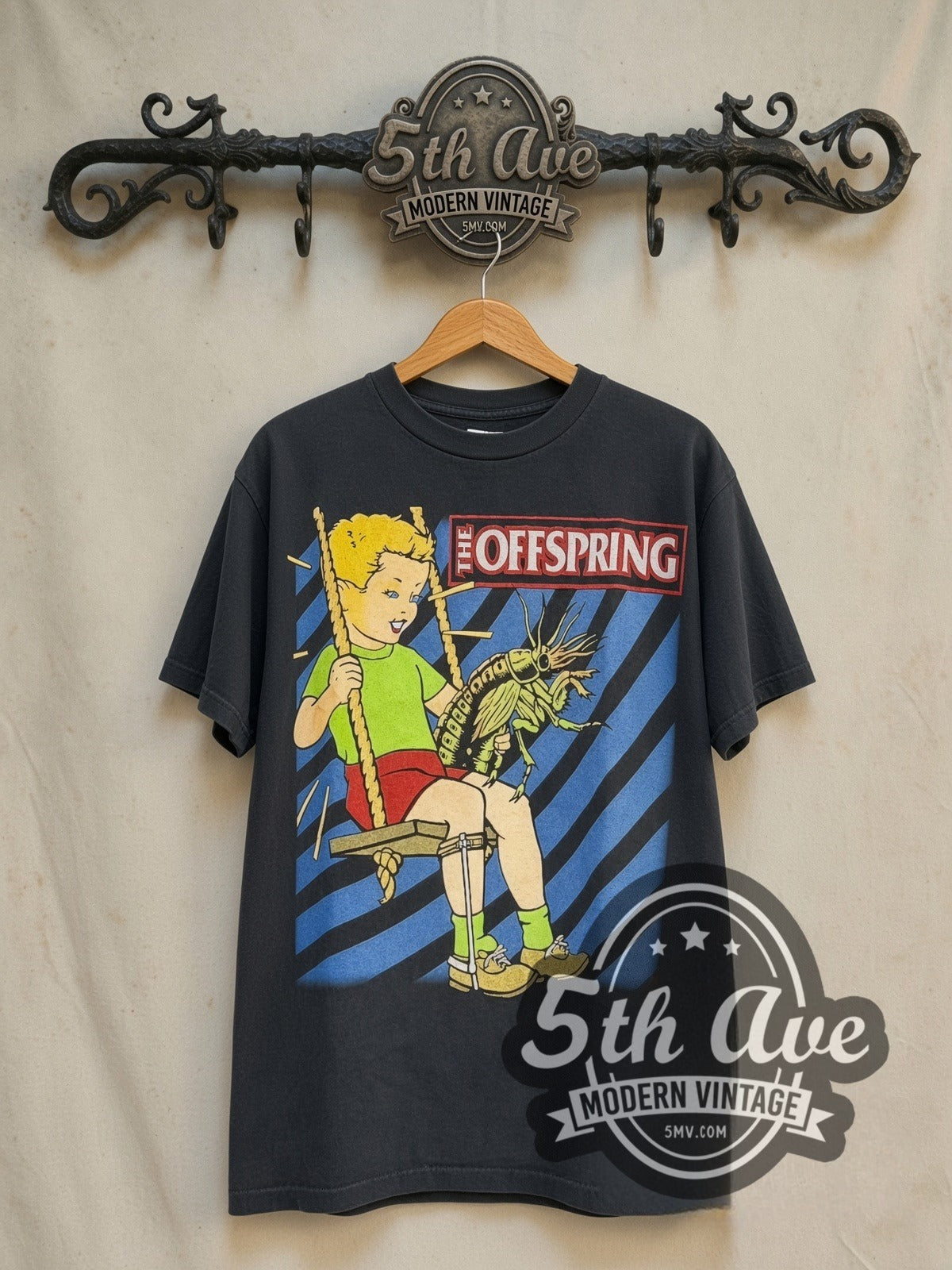 The Offspring Veritas vintage band t-shirt in black, front view on a display rack