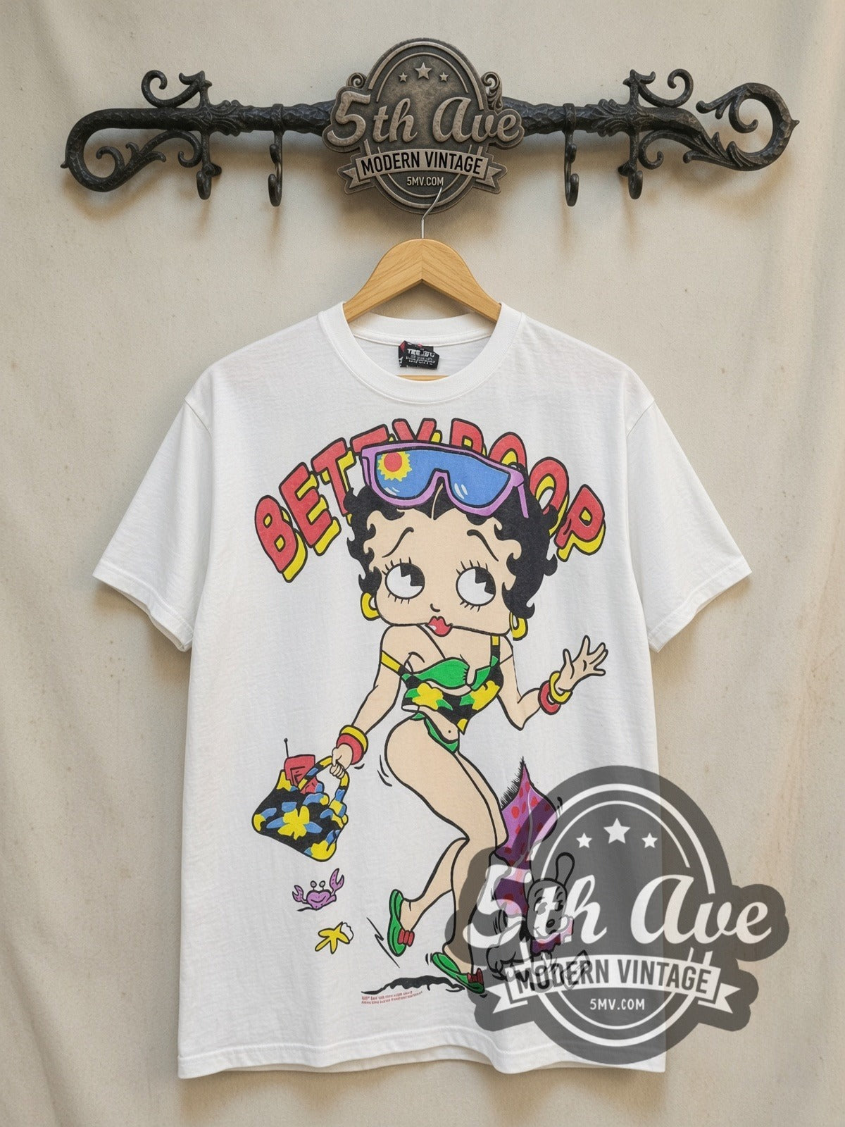 Betty Boop Retro Style T-Shirt Classic Cartoon vintage cartoon tee, front view on a display rack