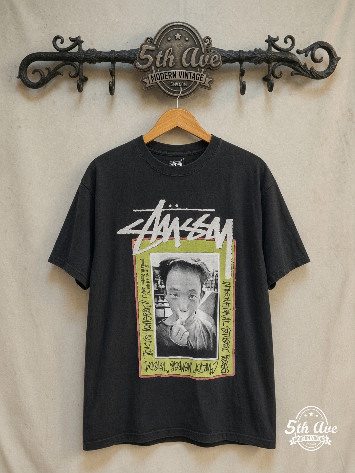 Stussy – Tokyo Homeboy Toyoda – Vintage Graphic Tee — front on locked cream ornate 5th Ave rack