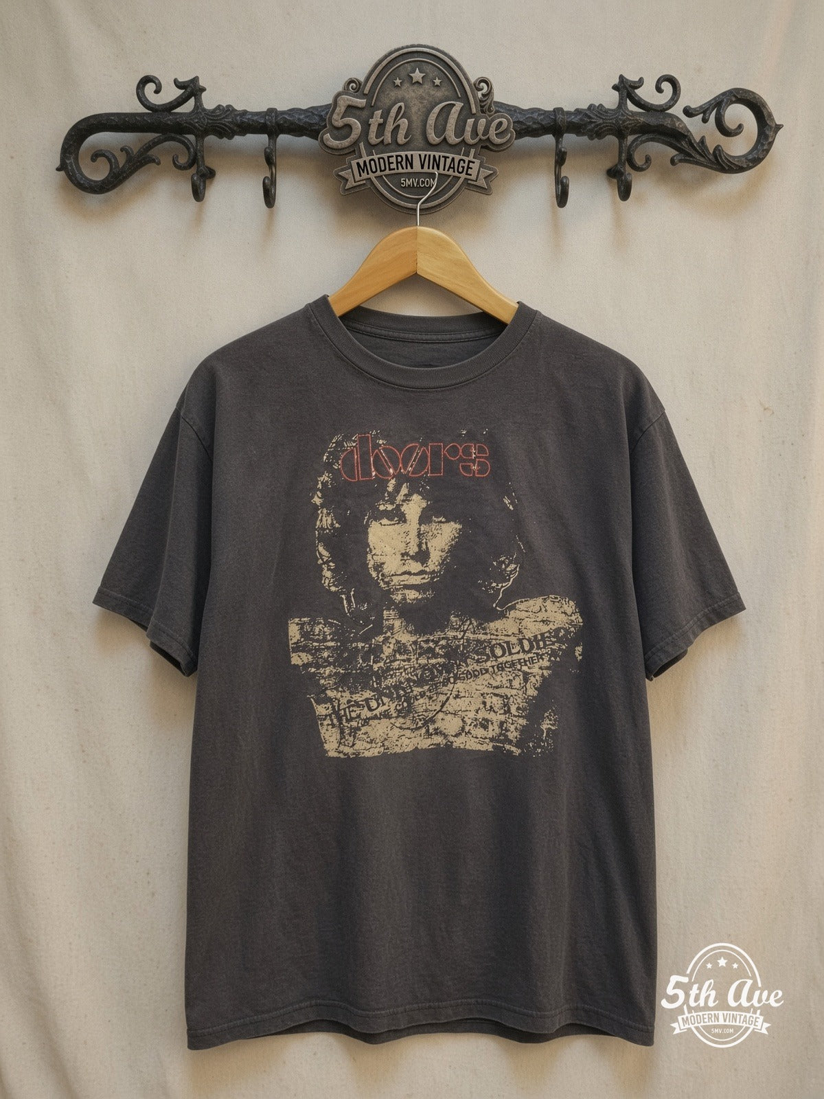Riders on the Storm: Jim Morrison The Doors t shirt – Vintage Band T-Shirt — front on locked cream ornate 5th Ave rack