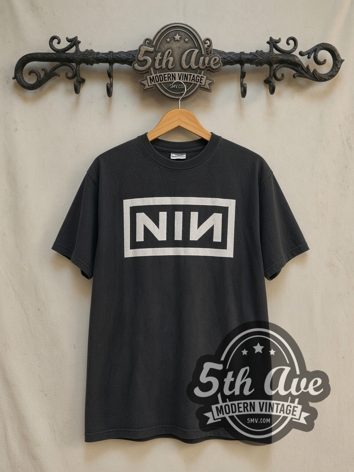 Nine Inch Nails NIИ 1995 vintage band t-shirt in black, front view on the 5MV rack
