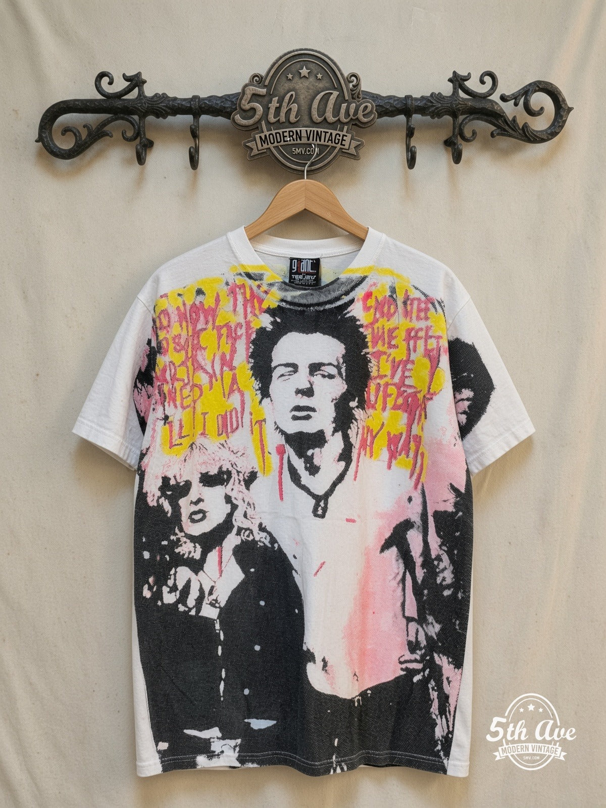 Sex Pistols – Sid Vicious and Nancy – All Over Print – Vintage Band T-Shirt — front on locked cream ornate 5th Ave rack