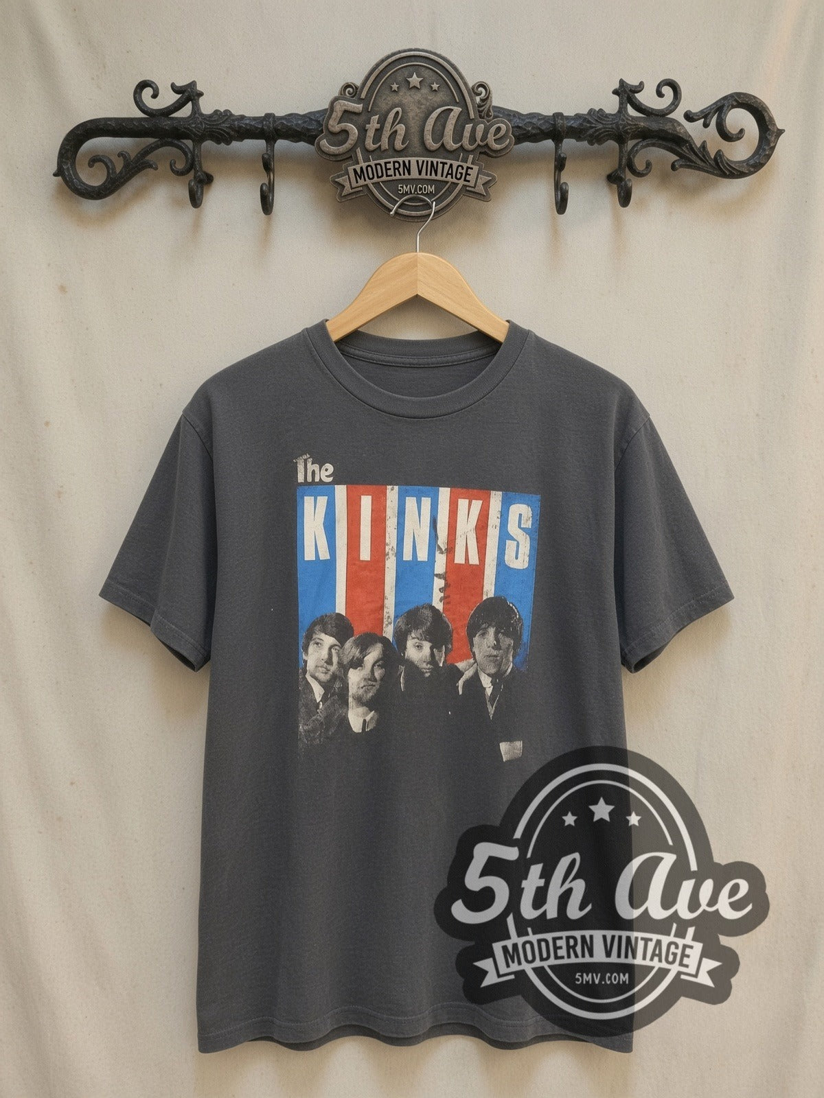 The Kinks vintage band t-shirt, front view on a display rack