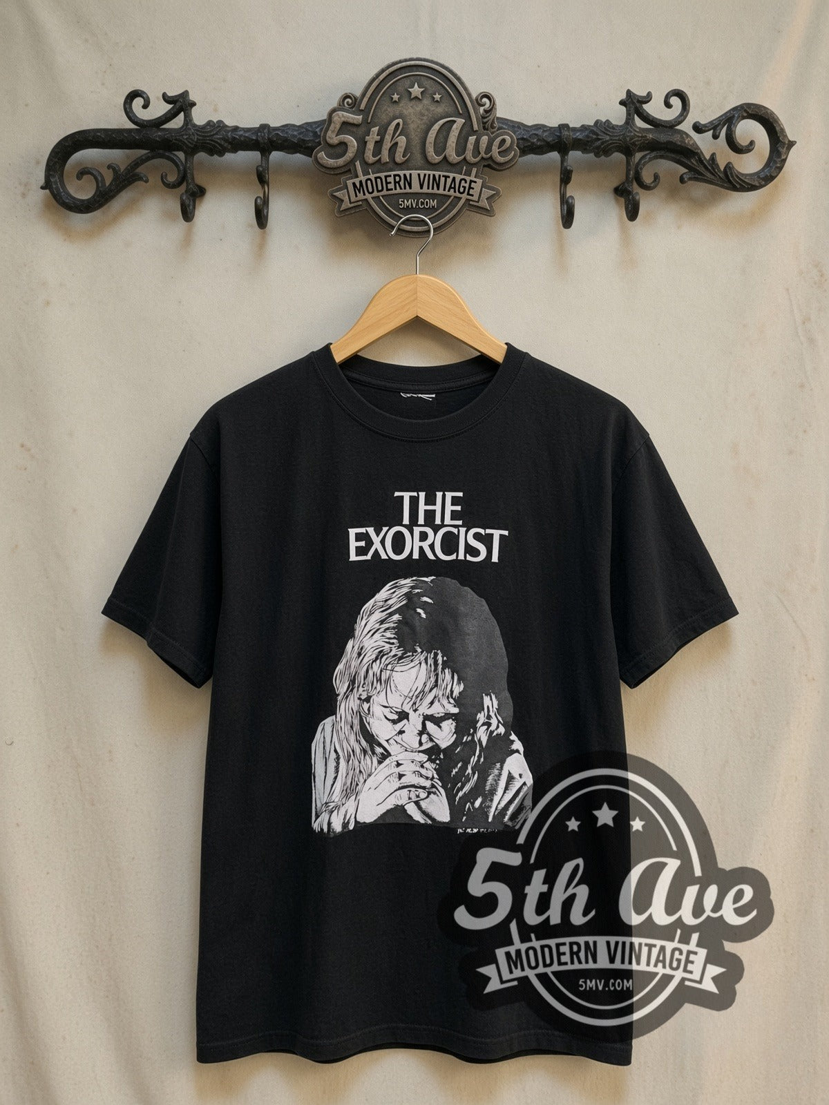 The Exorcist vintage movie t-shirt, front view on a display rack