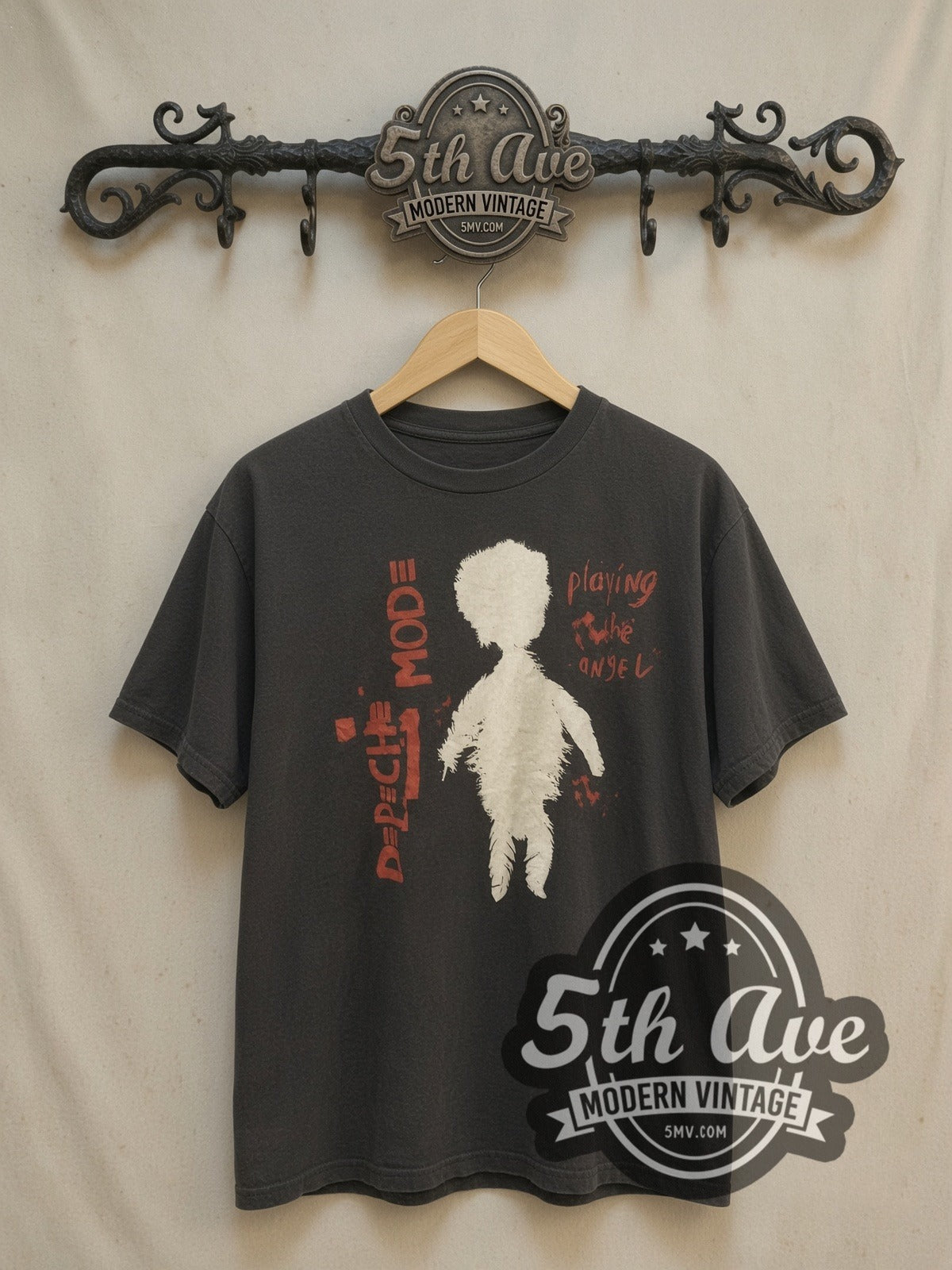 Depeche Mode Playing the Angel vintage band t-shirt, front view on a display rack