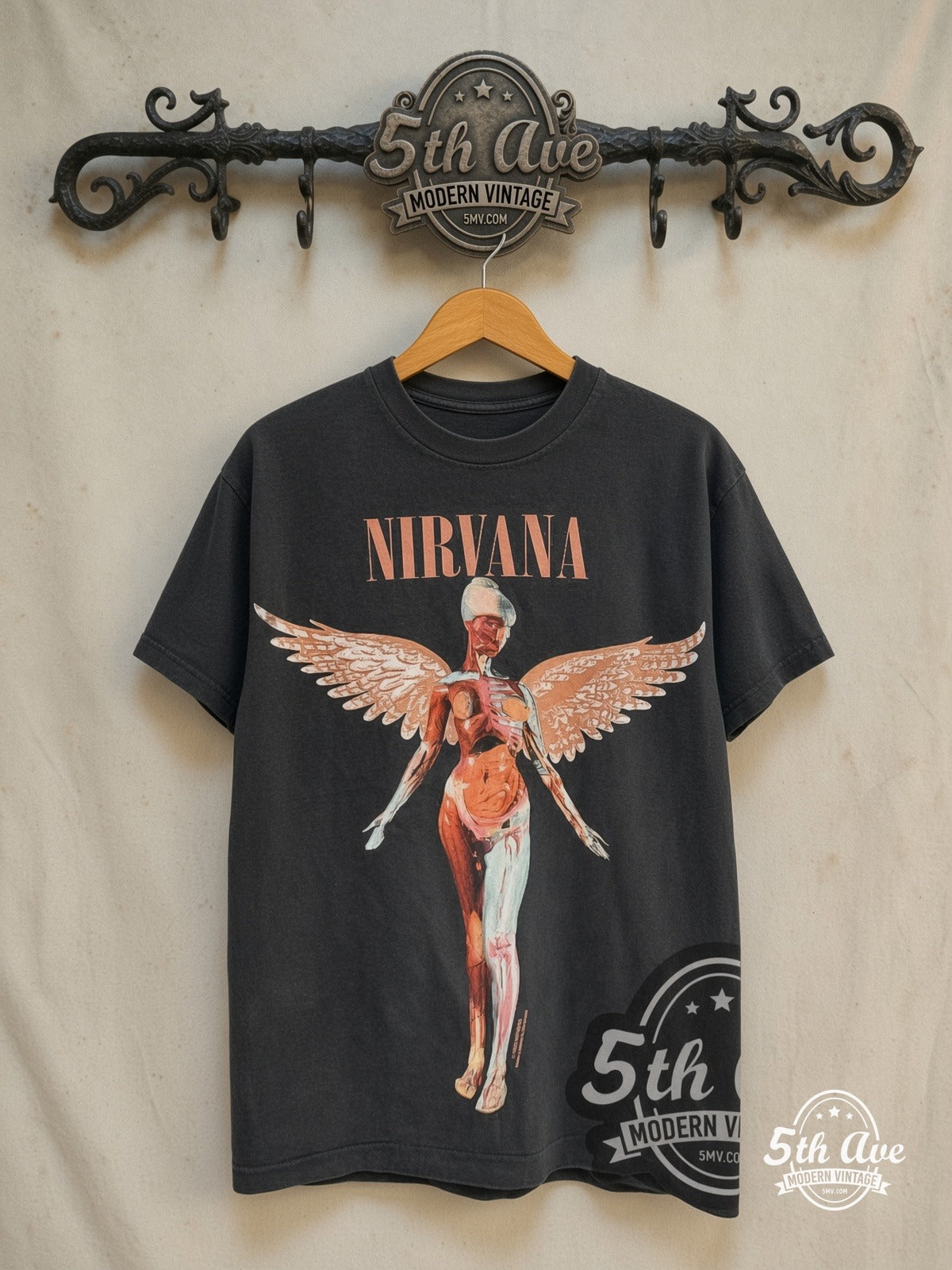 Nirvana – In Utero Copper Logo Front-Back Angel – Vintage Band T-Shirt — front on locked cream ornate 5th Ave rack