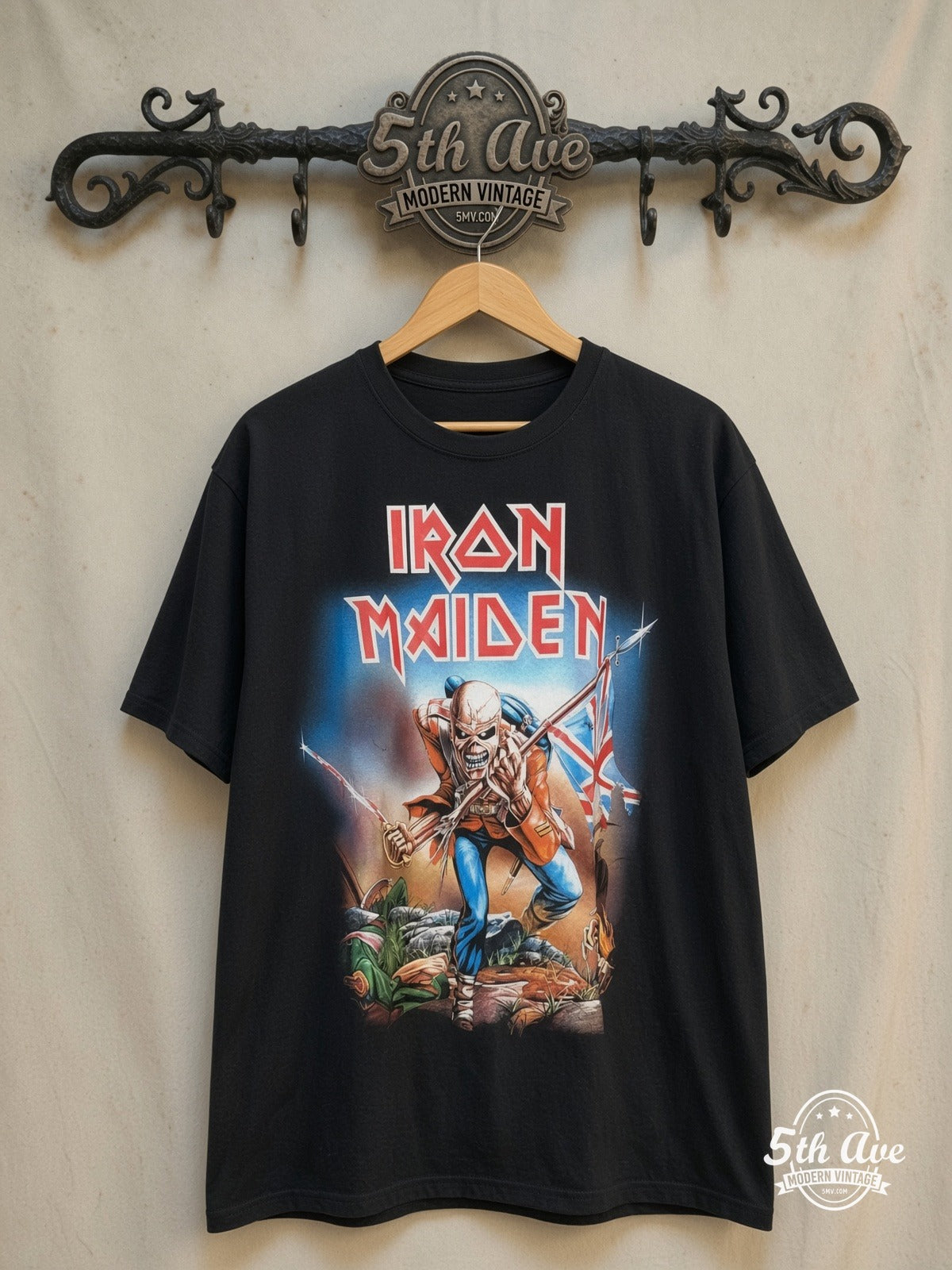 Iron Maiden – The Trooper Eddie Union Jack Sabre – Vintage Band T-Shirt — front on locked cream ornate 5th Ave rack