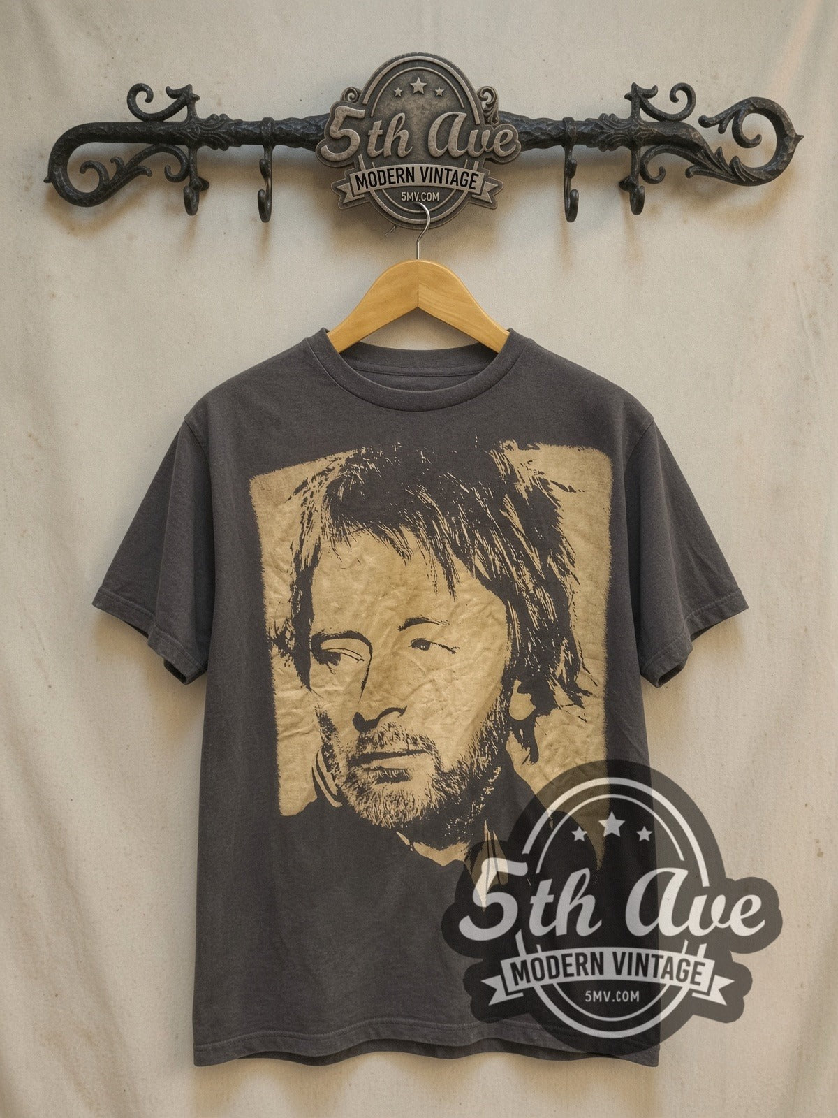 Thom Yorke vintage band t-shirt, front view on a display rack