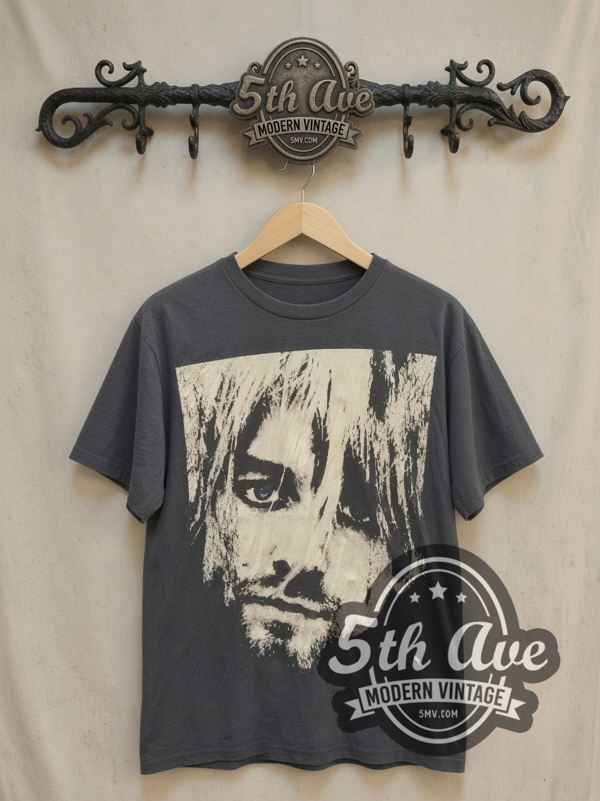 Nirvana KURT COBAIN vintage band t-shirt, front view on a display rack