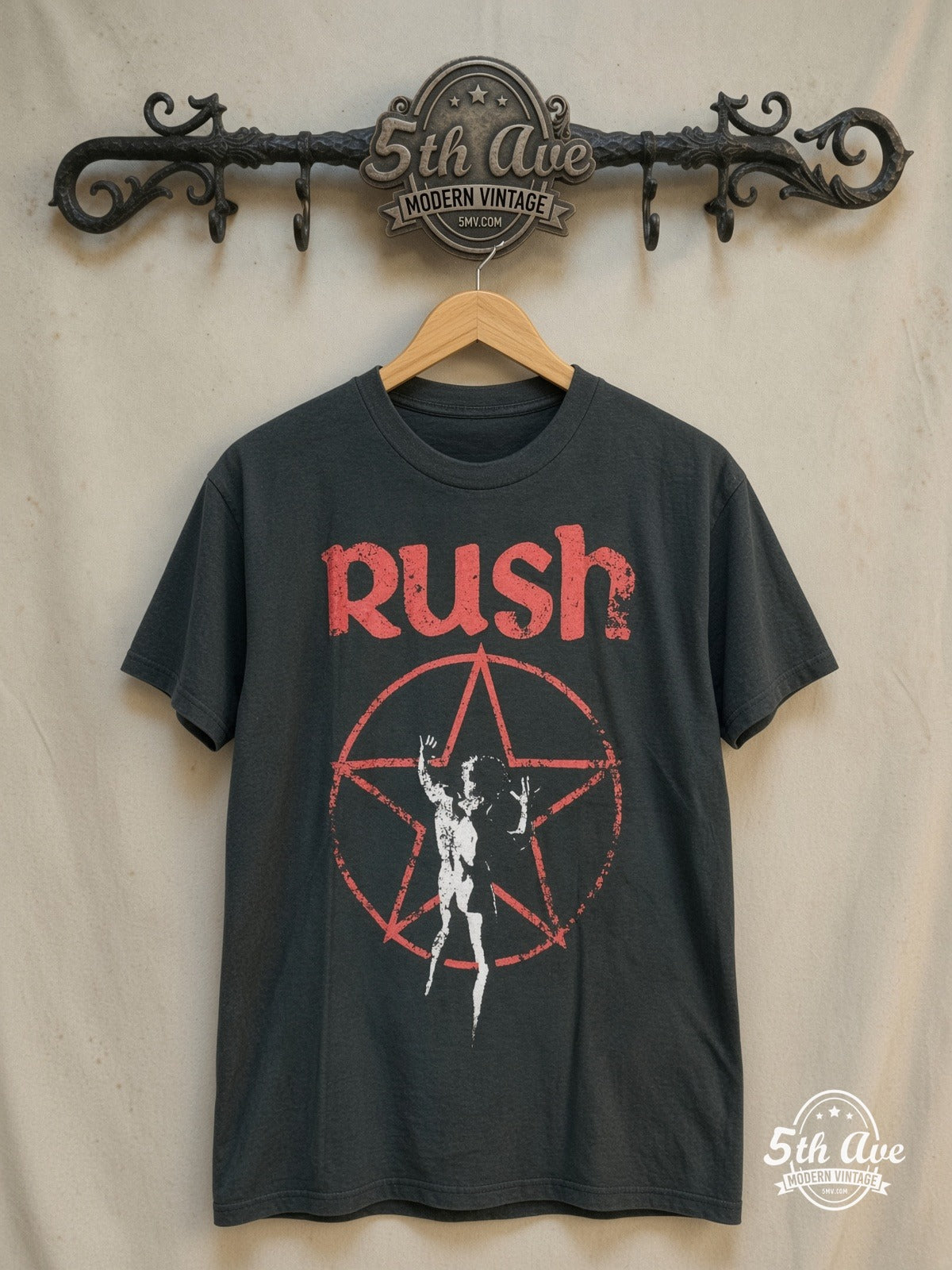 Rush – Starman – Vintage Band T-Shirt — front on locked cream ornate 5th Ave rack