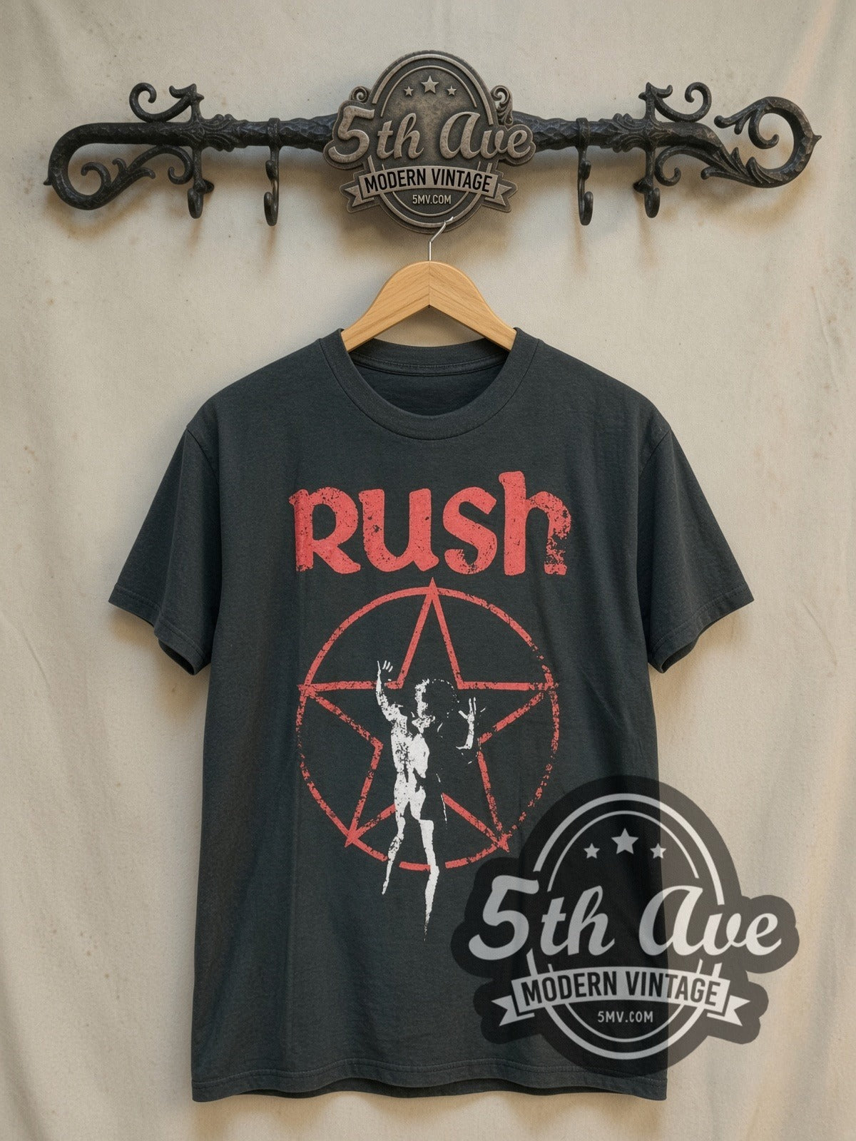 Rush Starman vintage band t-shirt, front view on a display rack