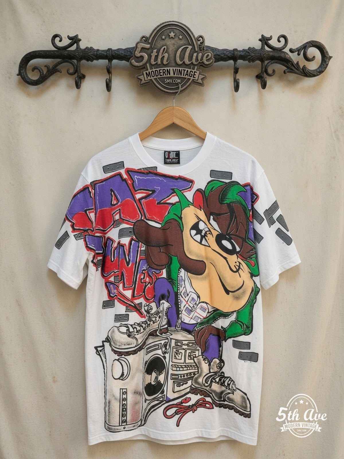 Looney Tunes – Taz-Mania Classic Look – All Over Print – New Vintage Graphic Tee — front on locked cream ornate 5th Ave rack