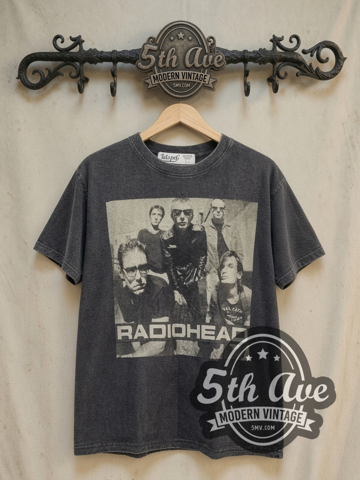 Radiohead Monochrome Band Photo Block Logo vintage band t-shirt, front view on a display rack