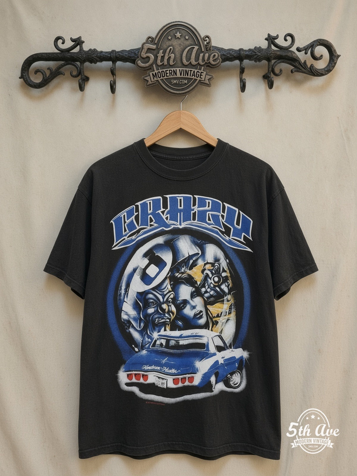 Crazy Rollin Hard Lowrider – Vintage Graphic Tee — front on locked cream ornate 5th Ave rack
