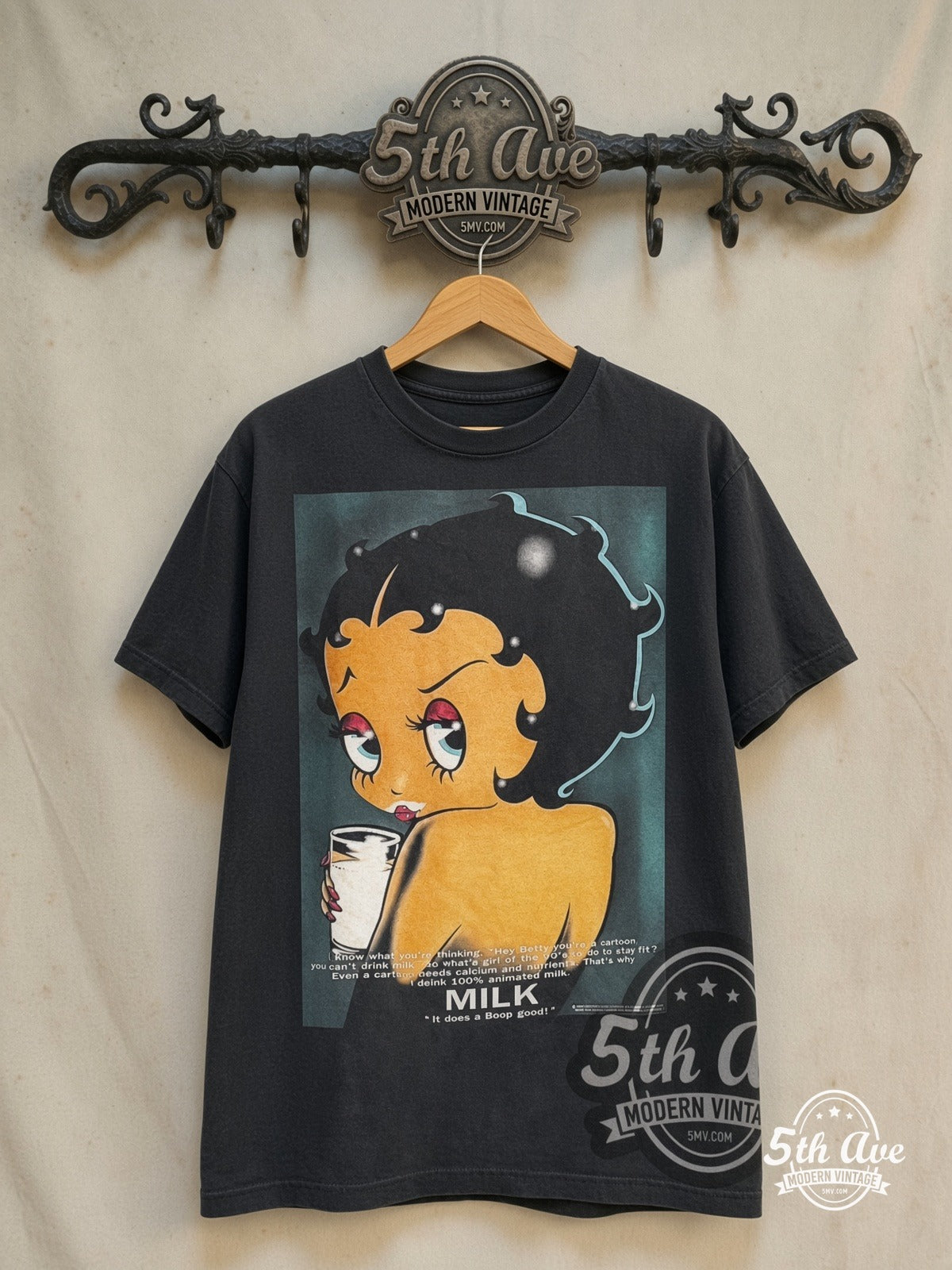 Betty Boop – Milk It Does a Boop Good – New Vintage Graphic Tee — front on locked cream ornate 5th Ave rack