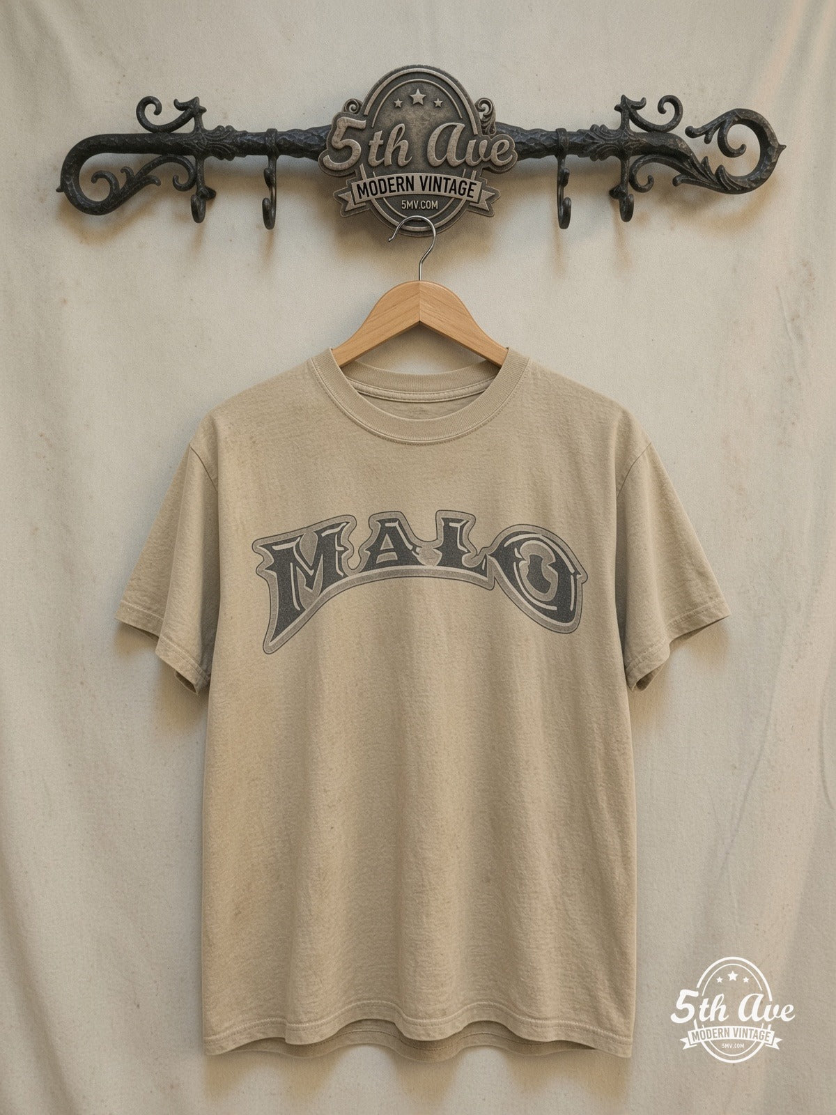 Malo – Malo pin-up and lowrider – Vintage Graphic Tee — front on locked cream ornate 5th Ave rack