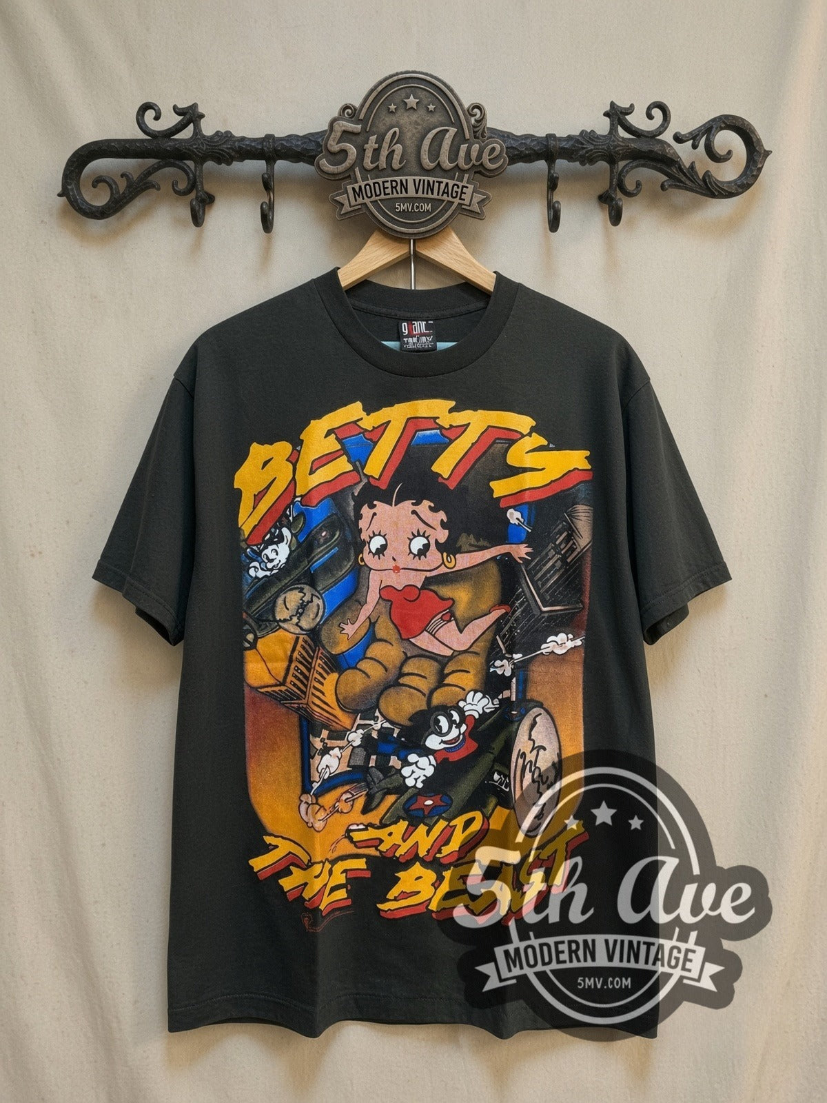 Betty Boop Betty and the Beast vintage cartoon tee, front view on a display rack