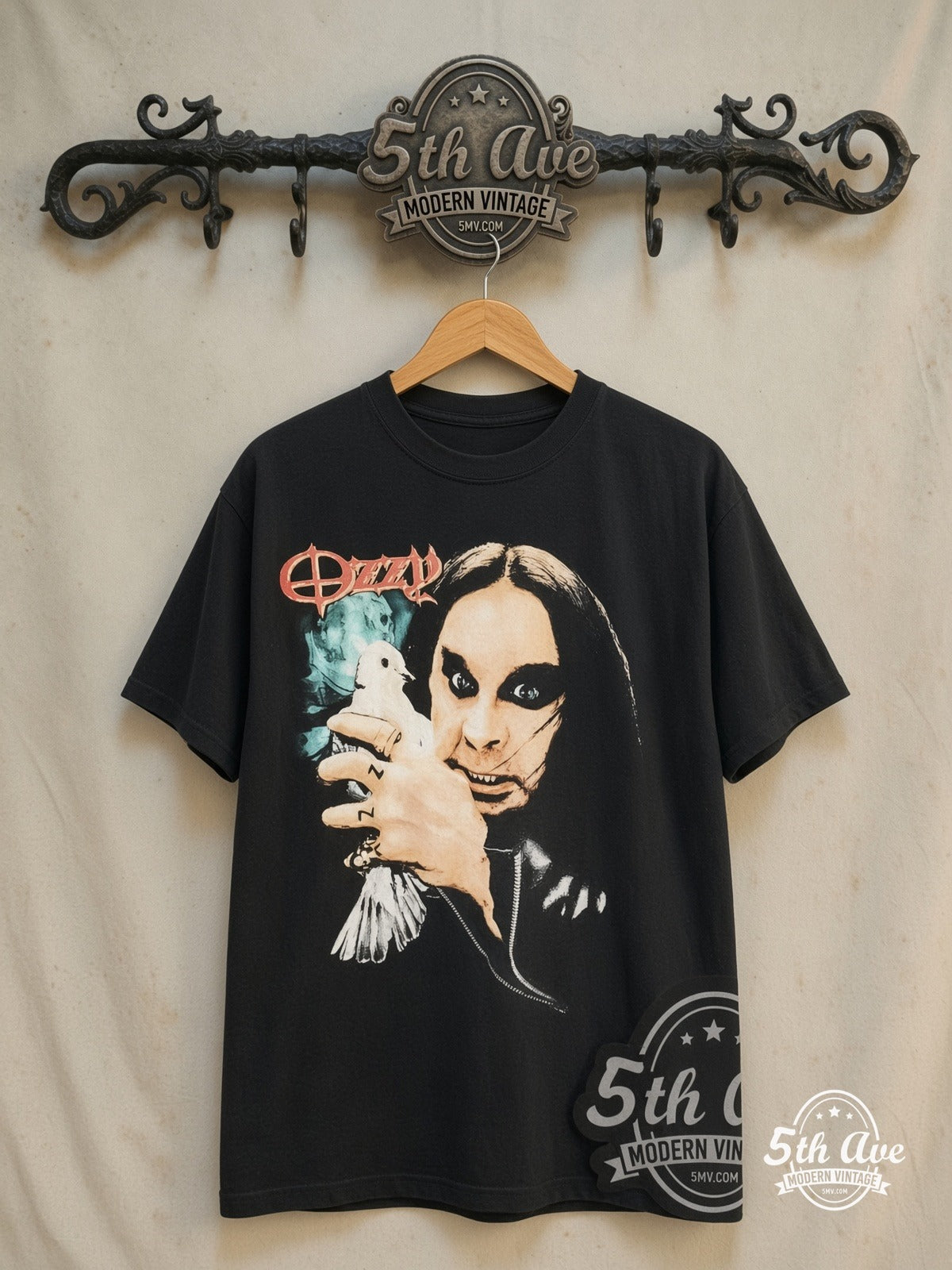 Ozzy Osbourne – Dove Holding Portrait Moon – Vintage Band T-Shirt — front on locked cream ornate 5th Ave rack