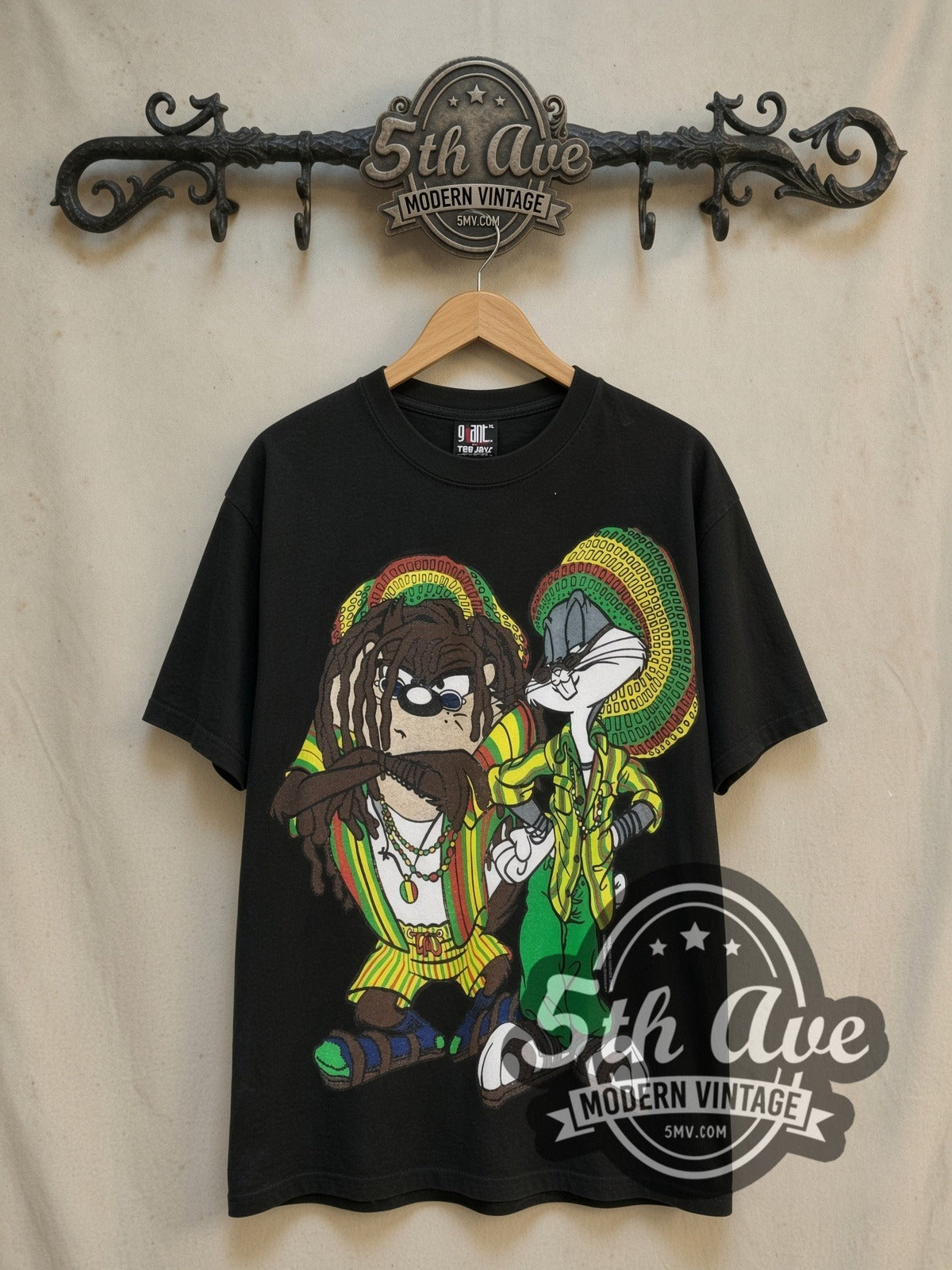 Looney Tunes Rasta Bugs Bunny and Tasmanian Devil vintage cartoon tee, front view on a display rack