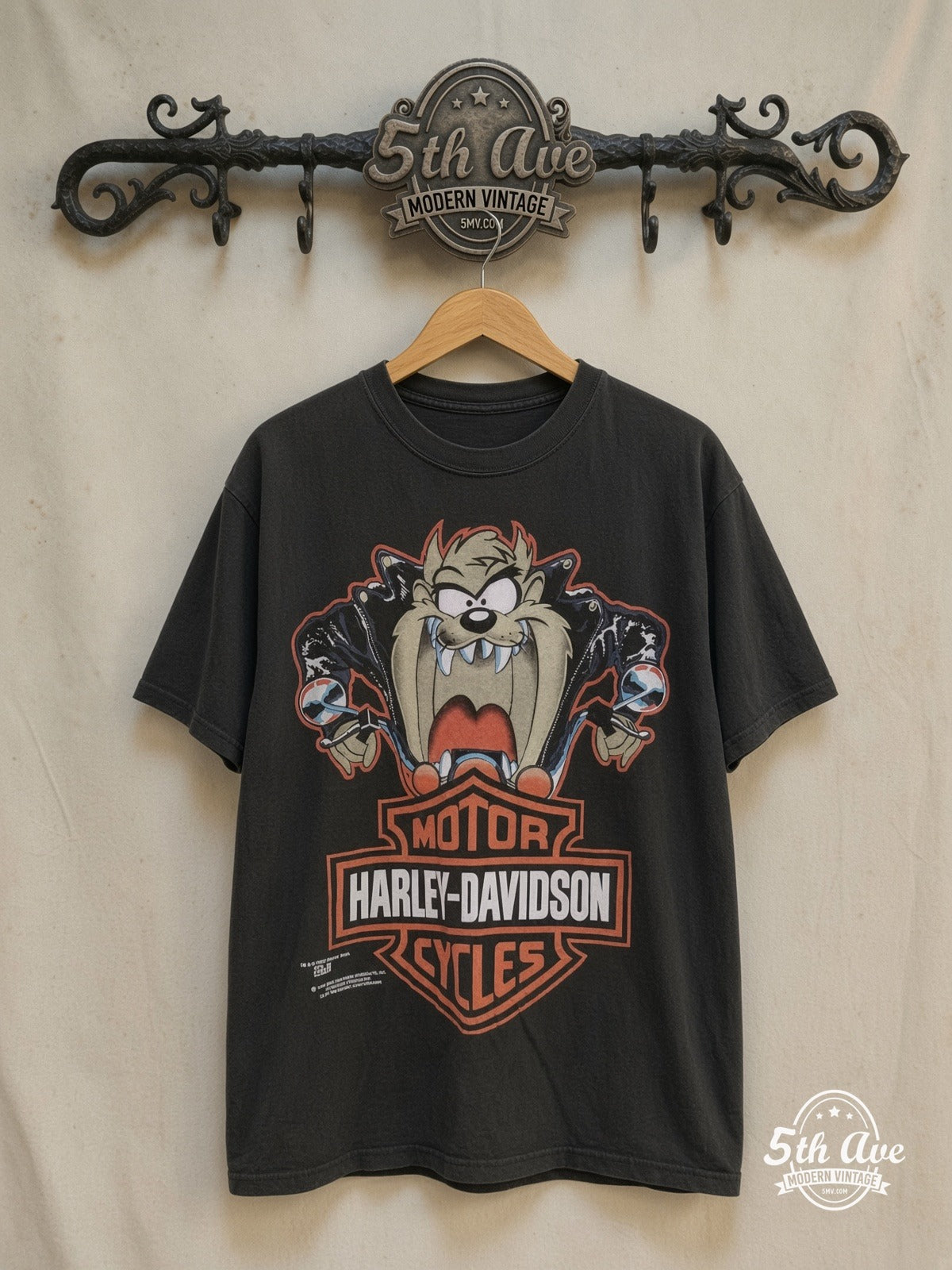 Looney Tunes Taz Harley-Davidson graphic tee, front view on a display rack