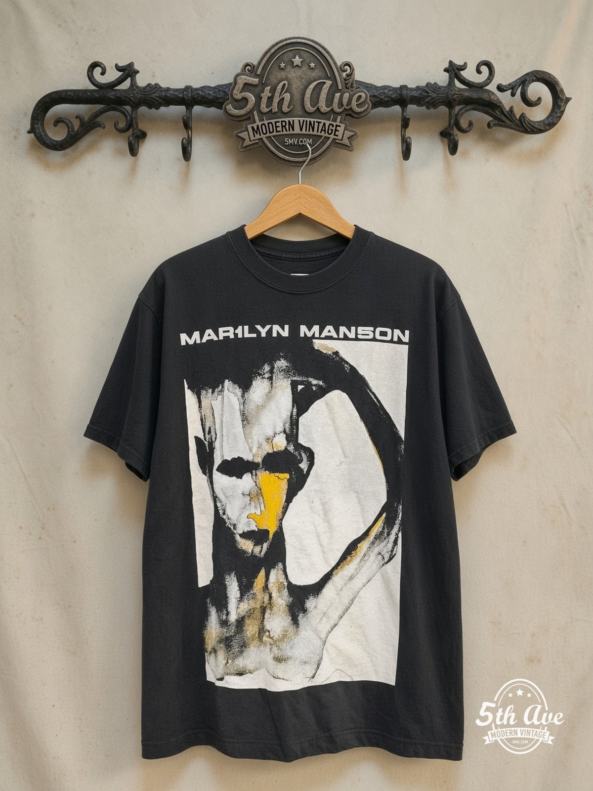 Marilyn Manson 'I Don't Like the Drugs' (But the Drugs Like Me) – Vintage Band T-Shirt — front on locked cream ornate 5th Ave rack