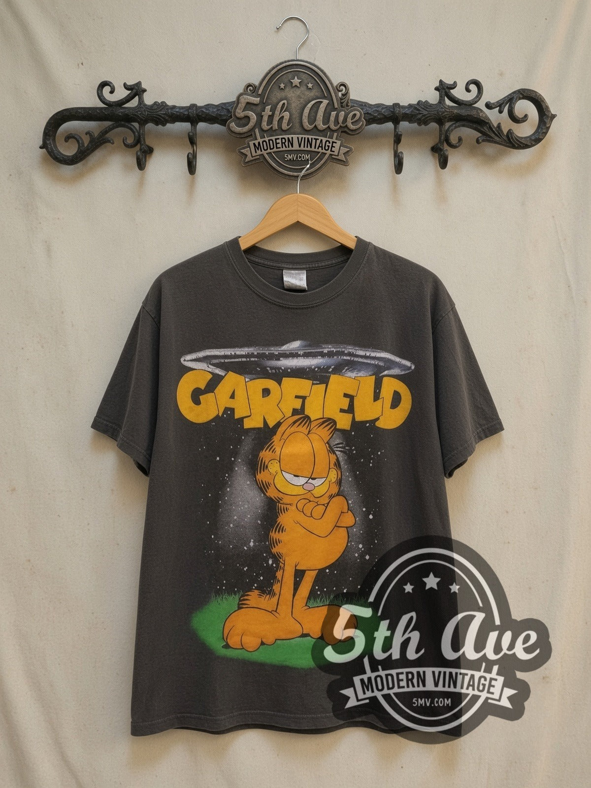 Garfield Aliens UFO vintage cartoon tee, front view on a display rack