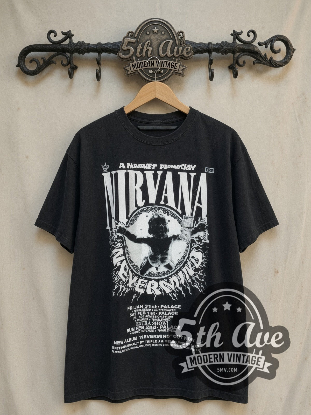 Nirvana Nevermind Australian Palace Concert Poster vintage band t-shirt, front view on a display rack