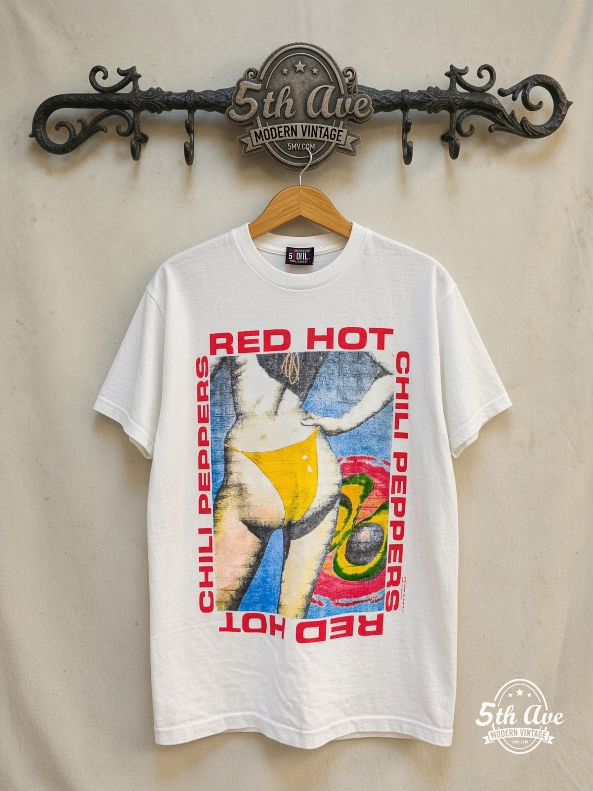 Red Hot Chili Peppers – Bikini Avocado – Vintage Band T-Shirt — front on locked cream ornate 5th Ave rack