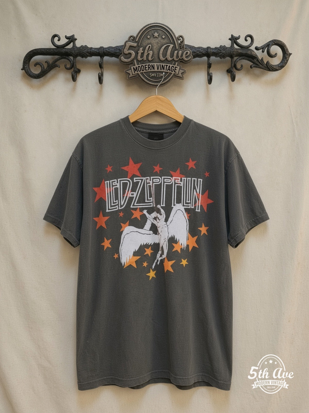 Led Zeppelin – 1977 Tour – Vintage Band T-Shirt — front on locked cream ornate 5th Ave rack