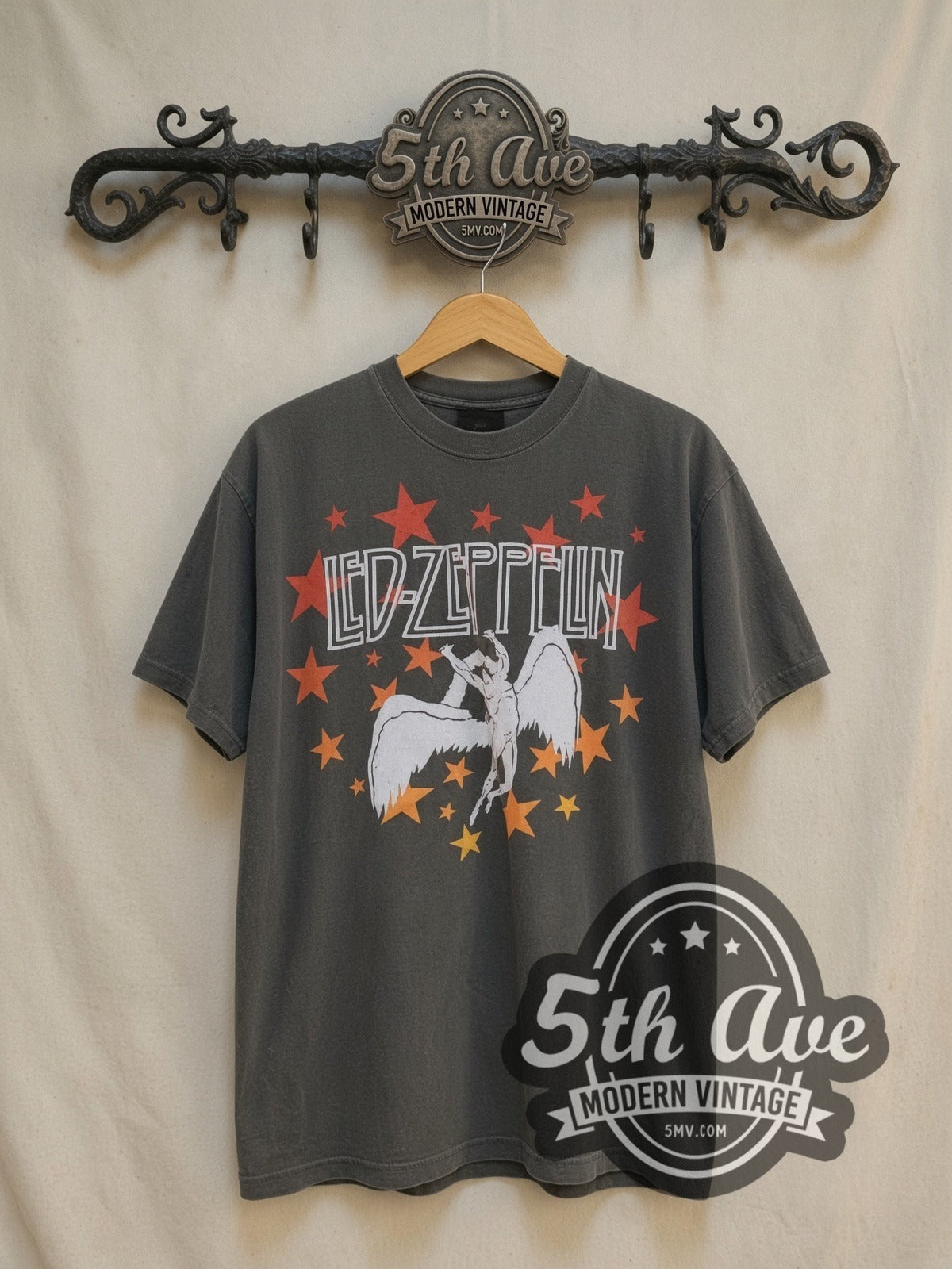 Led Zeppelin 1977 Tour vintage band t-shirt, front view on a display rack