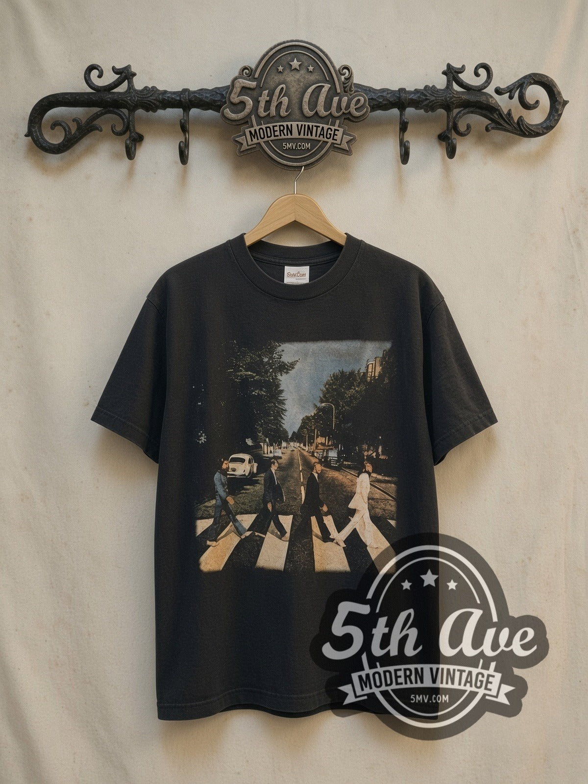 The Beatles Abbey Road Crossing vintage band t-shirt, front view on a display rack