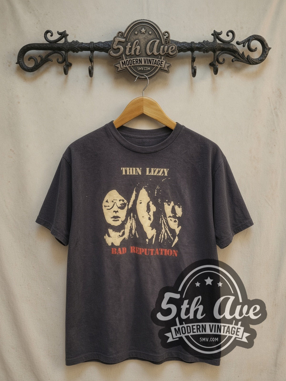 Thin Lizzy Bad Reputation Album Cover vintage band t-shirt, front view on a display rack
