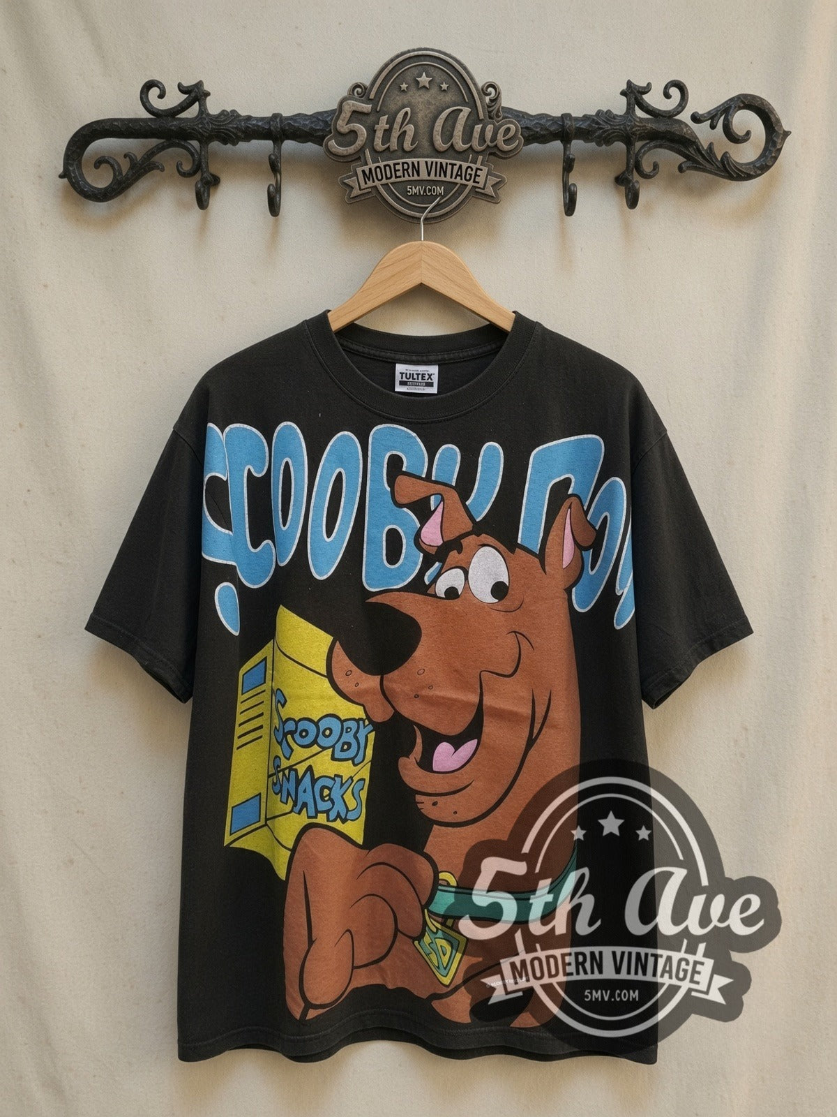 Scooby-Doo Munchies vintage cartoon tee, front view on a display rack