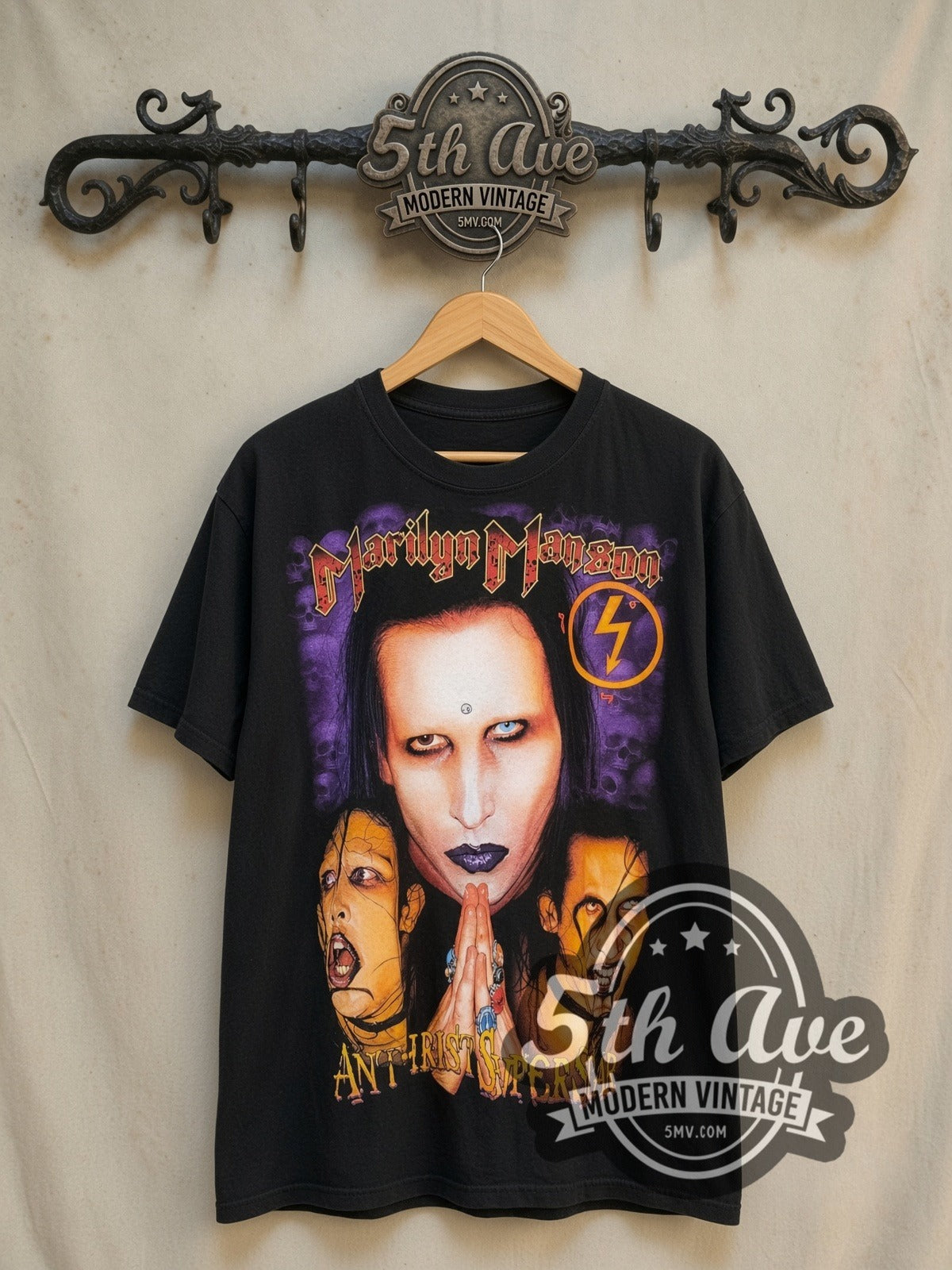 Marilyn Manson Antichrist Superstar Prayer Hands Skulls vintage band t-shirt, front view on a display rack