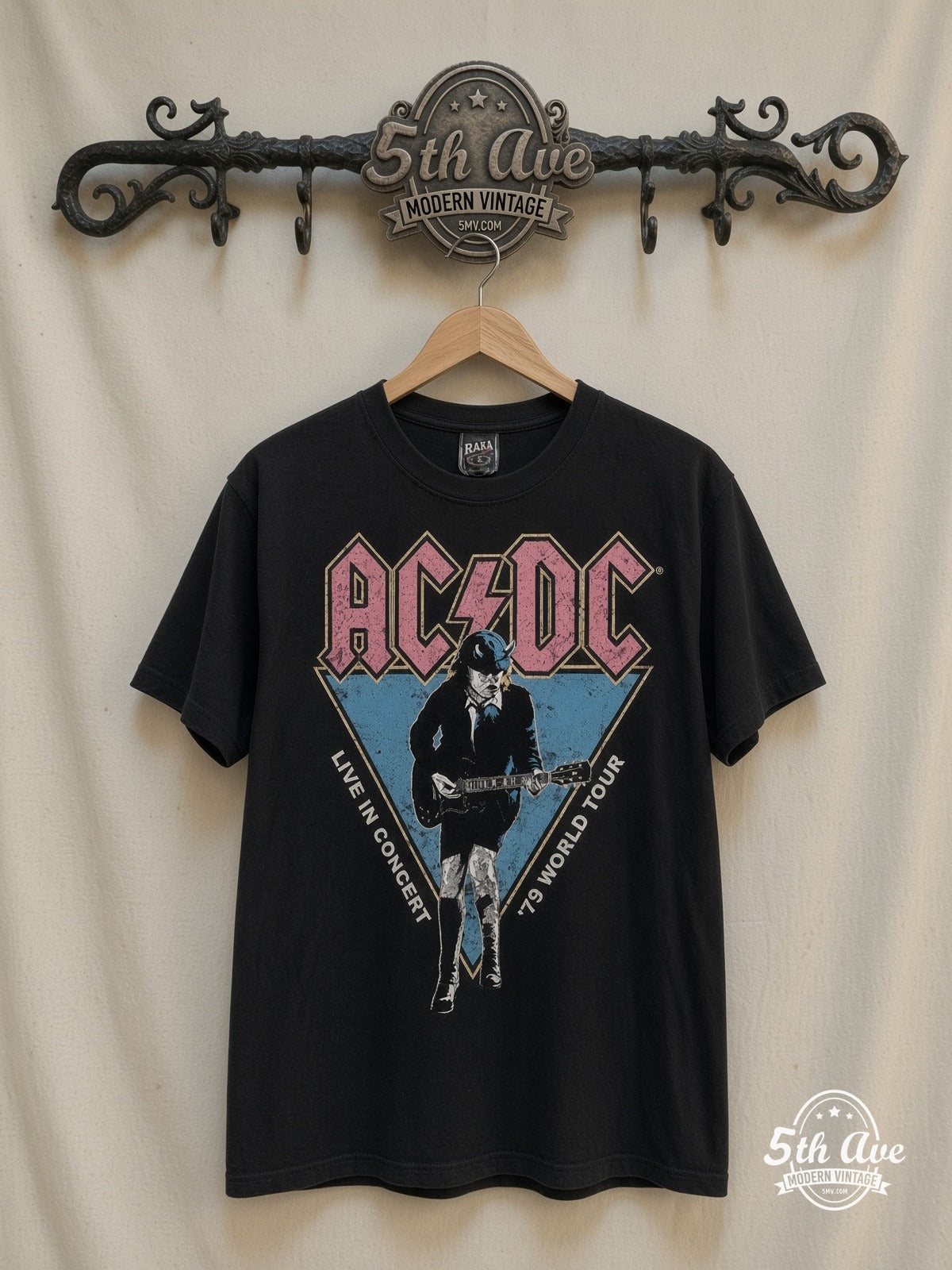 AC/DC – Live in Concert '79 World Tour – Vintage Band T-Shirt — front on locked cream ornate 5th Ave rack