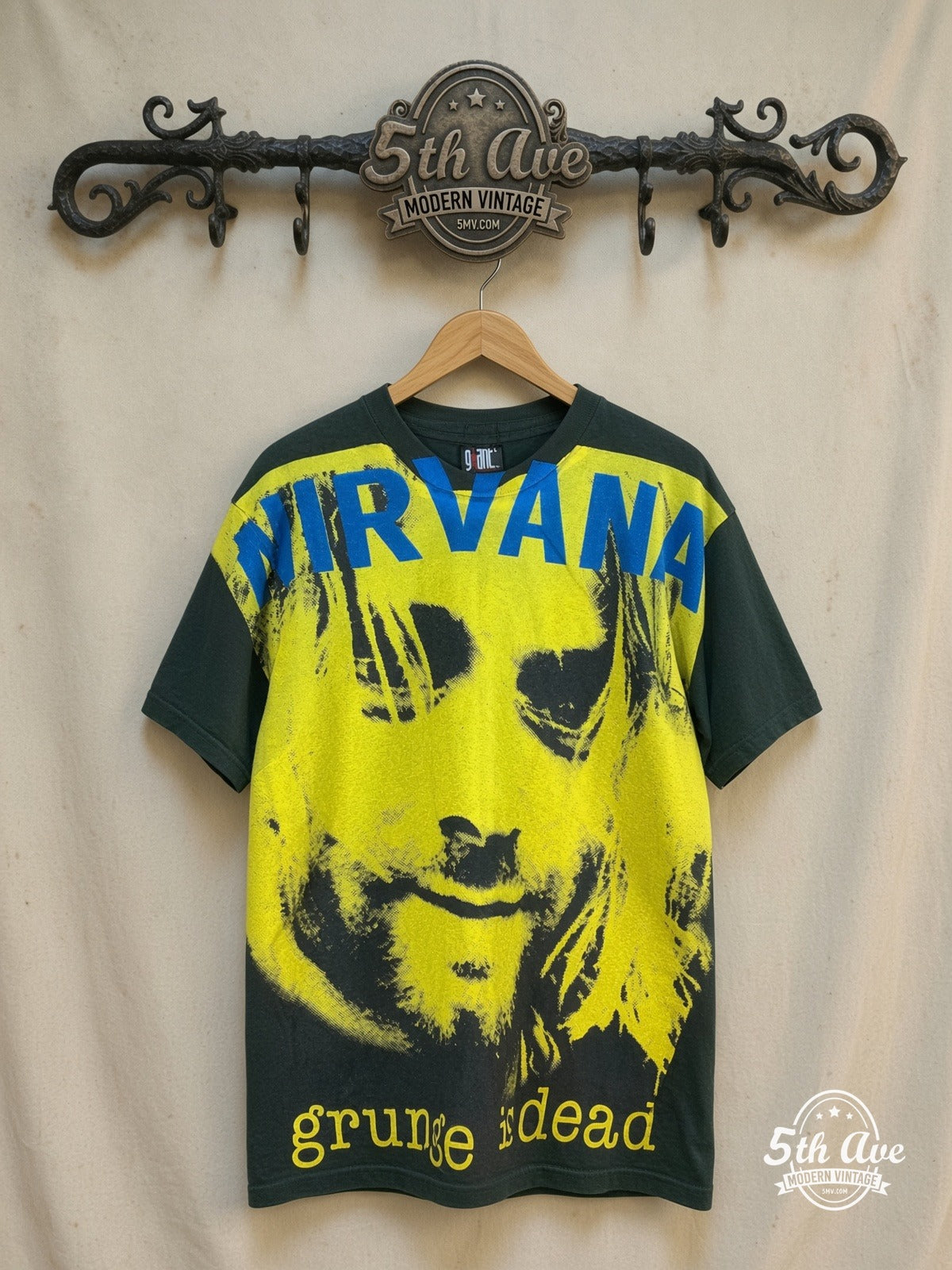 Nirvana – Grunge Is Dead – All Over Print – Vintage Band T-Shirt — front on locked cream ornate 5th Ave rack