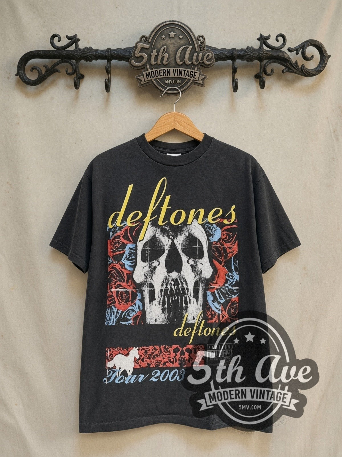 Deftones Tour 2003 vintage band t-shirt in black, front view on a display rack