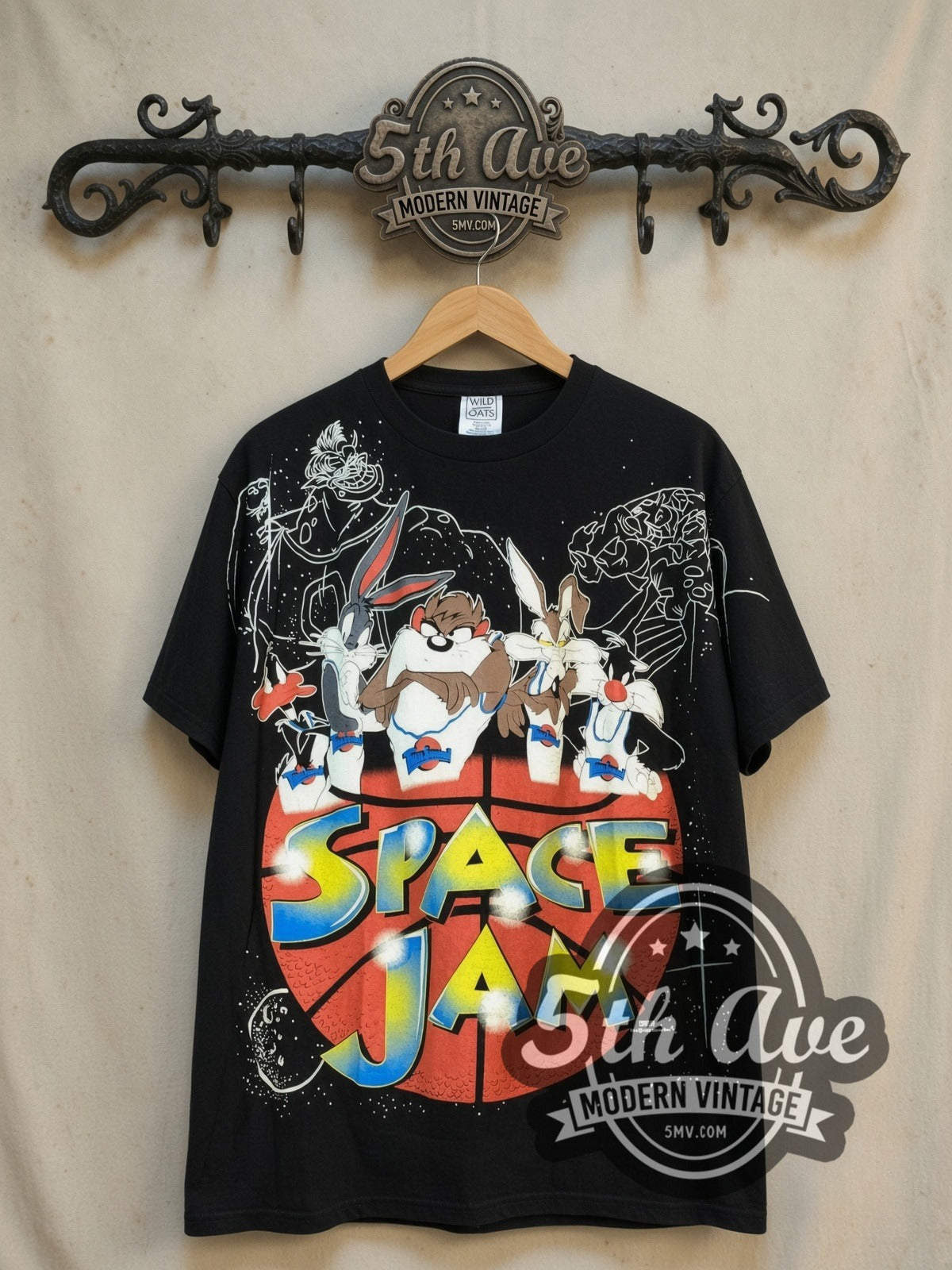 Looney Tunes Space Jam Basketball Logo vintage cartoon tee, front view on a display rack